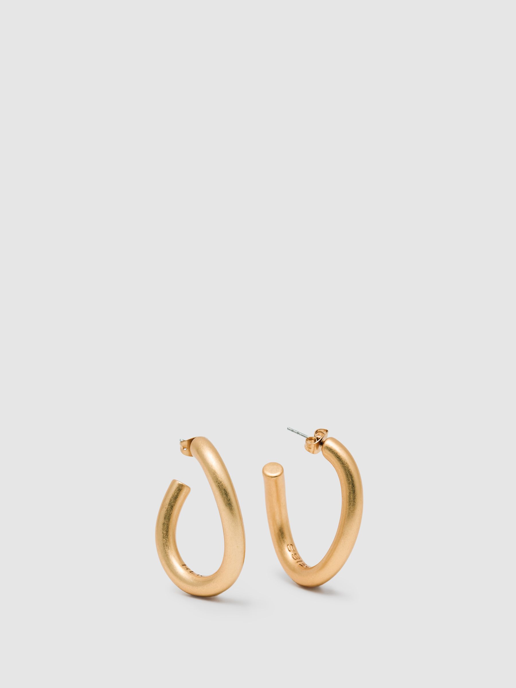 Wave Hoop Earrings in Gold Tone