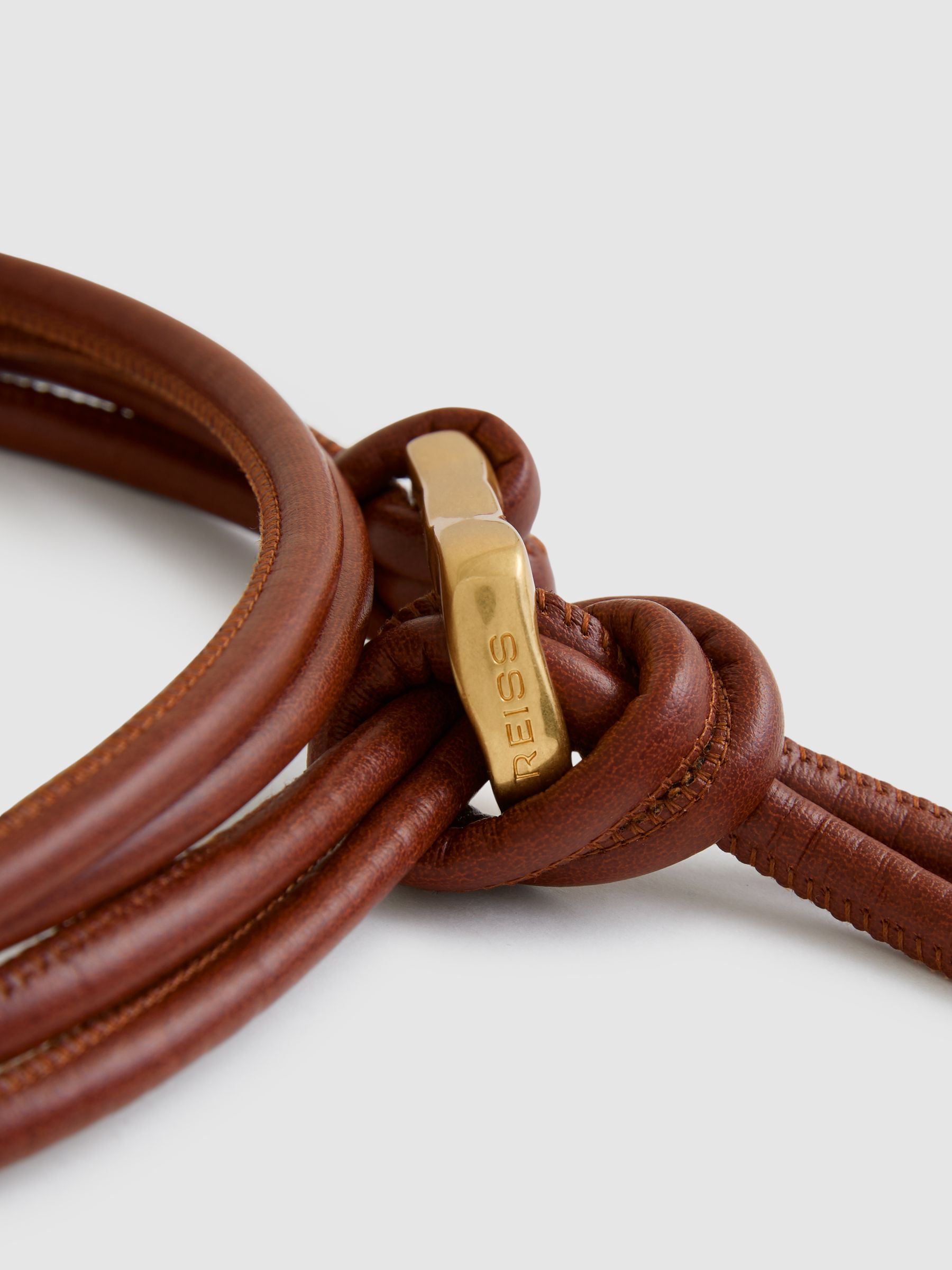 Sculpted Buckle Tubular Tie Belt in Tan
