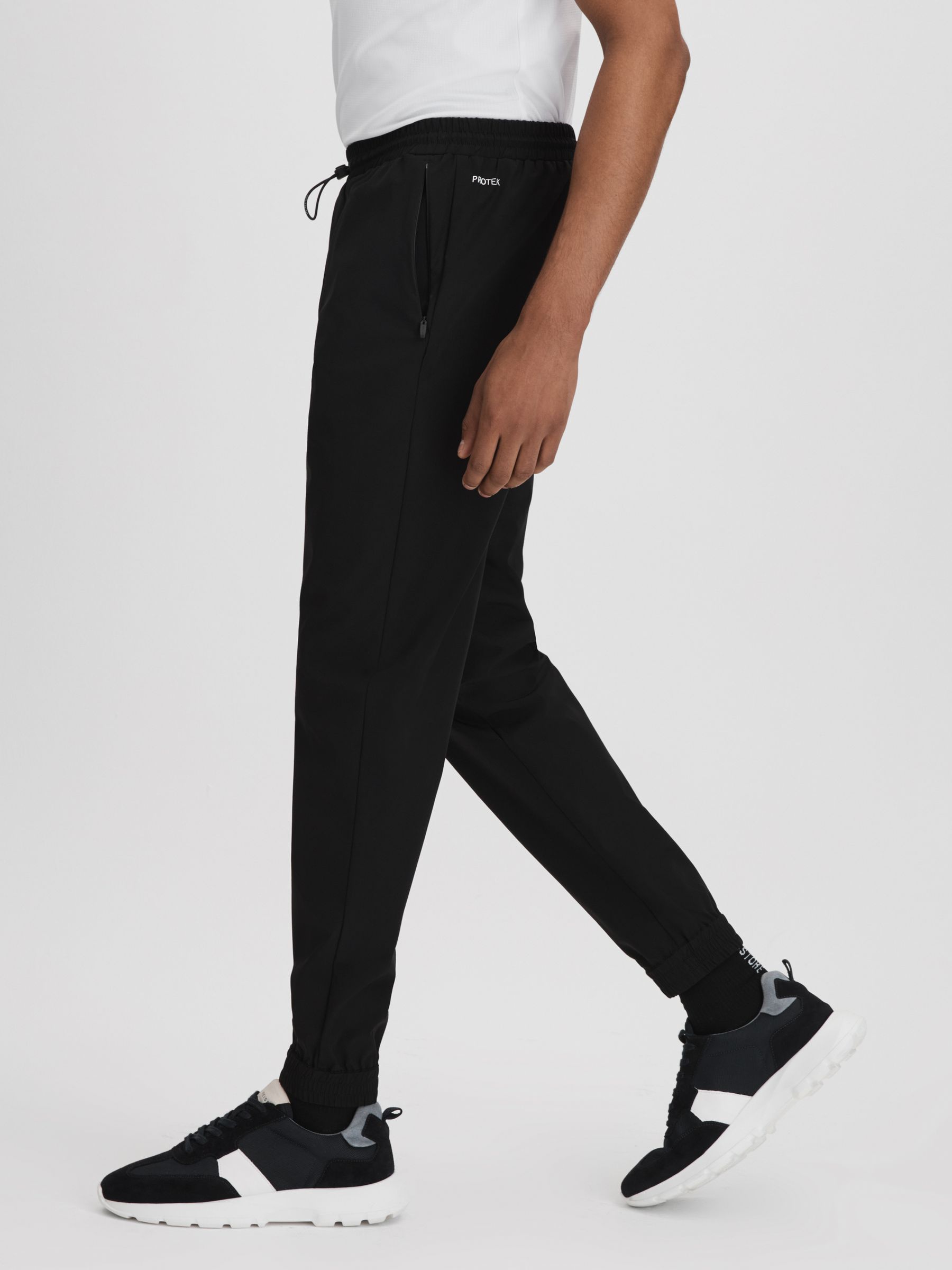 Castore Water Repellent Track Joggers in Onyx Black