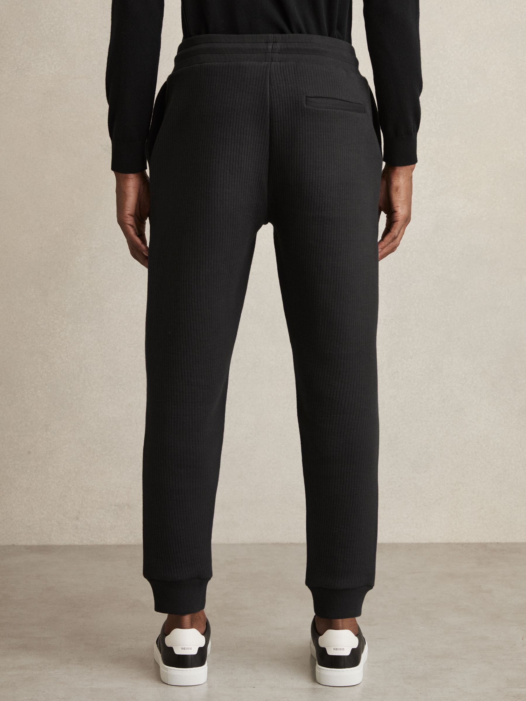 Cotton-Blend Ribbed Drawstring Joggers in Washed Black