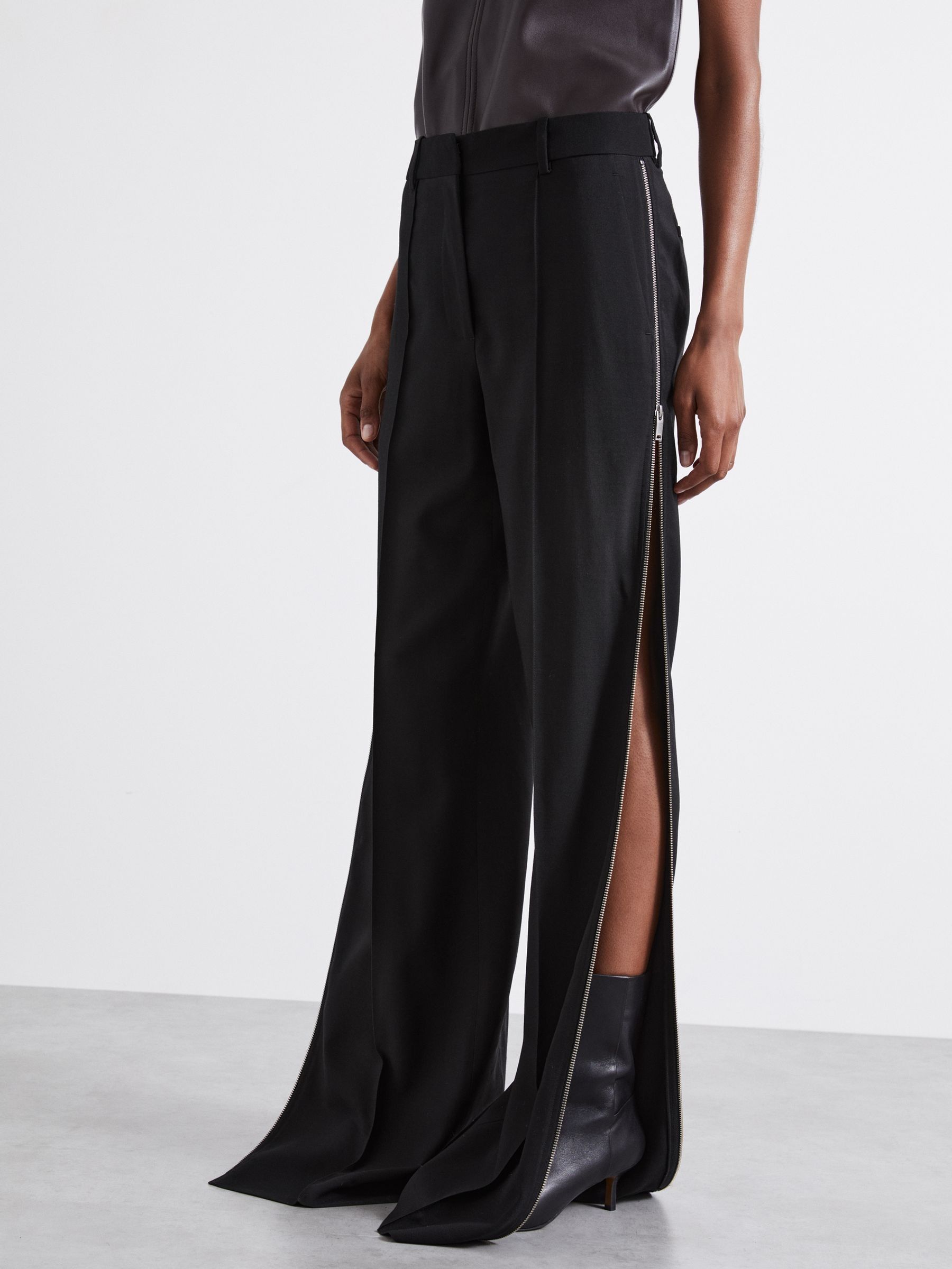 Atelier Virgin-Wool Zipped-Outseam Trousers in Black