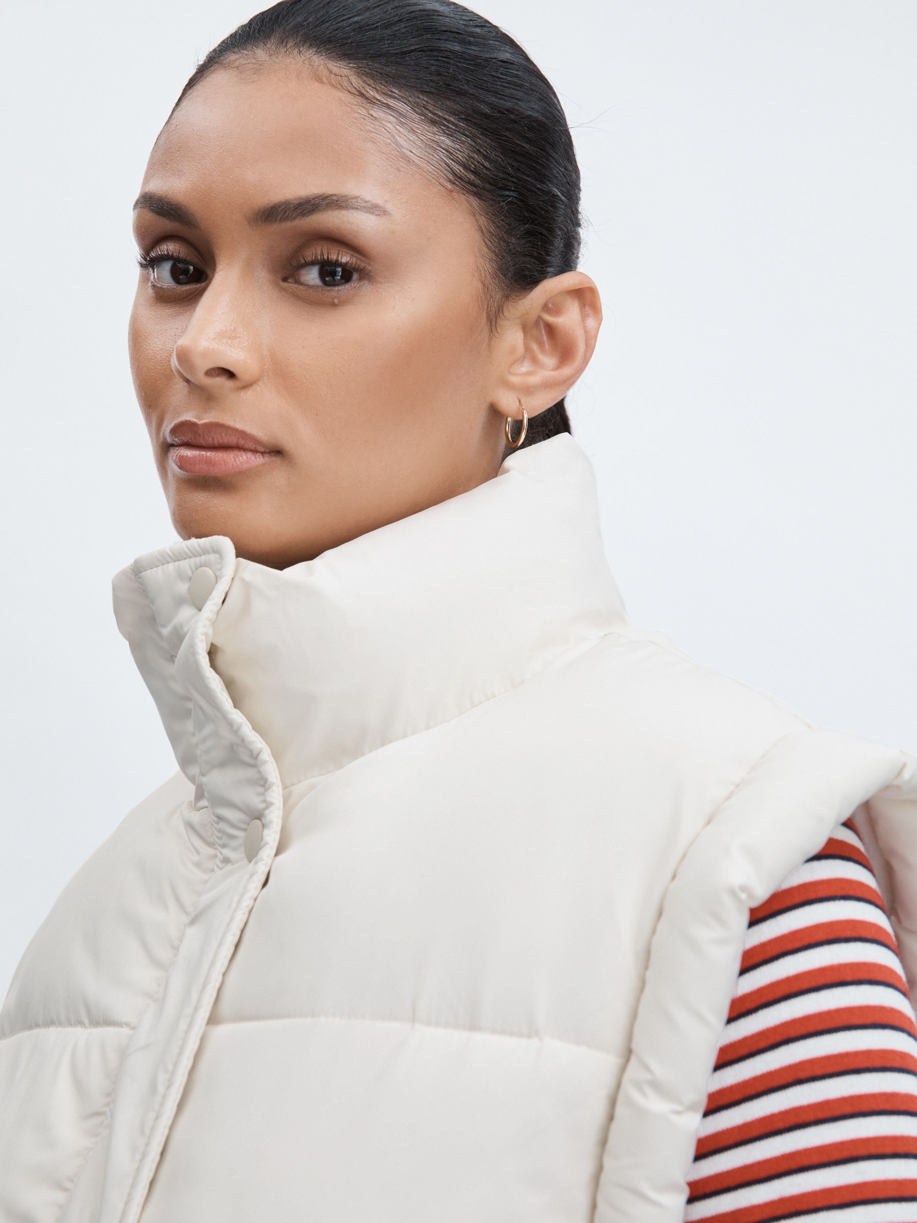 The Upside Contrast-Panel Puffer Gilet in Off White/Multi