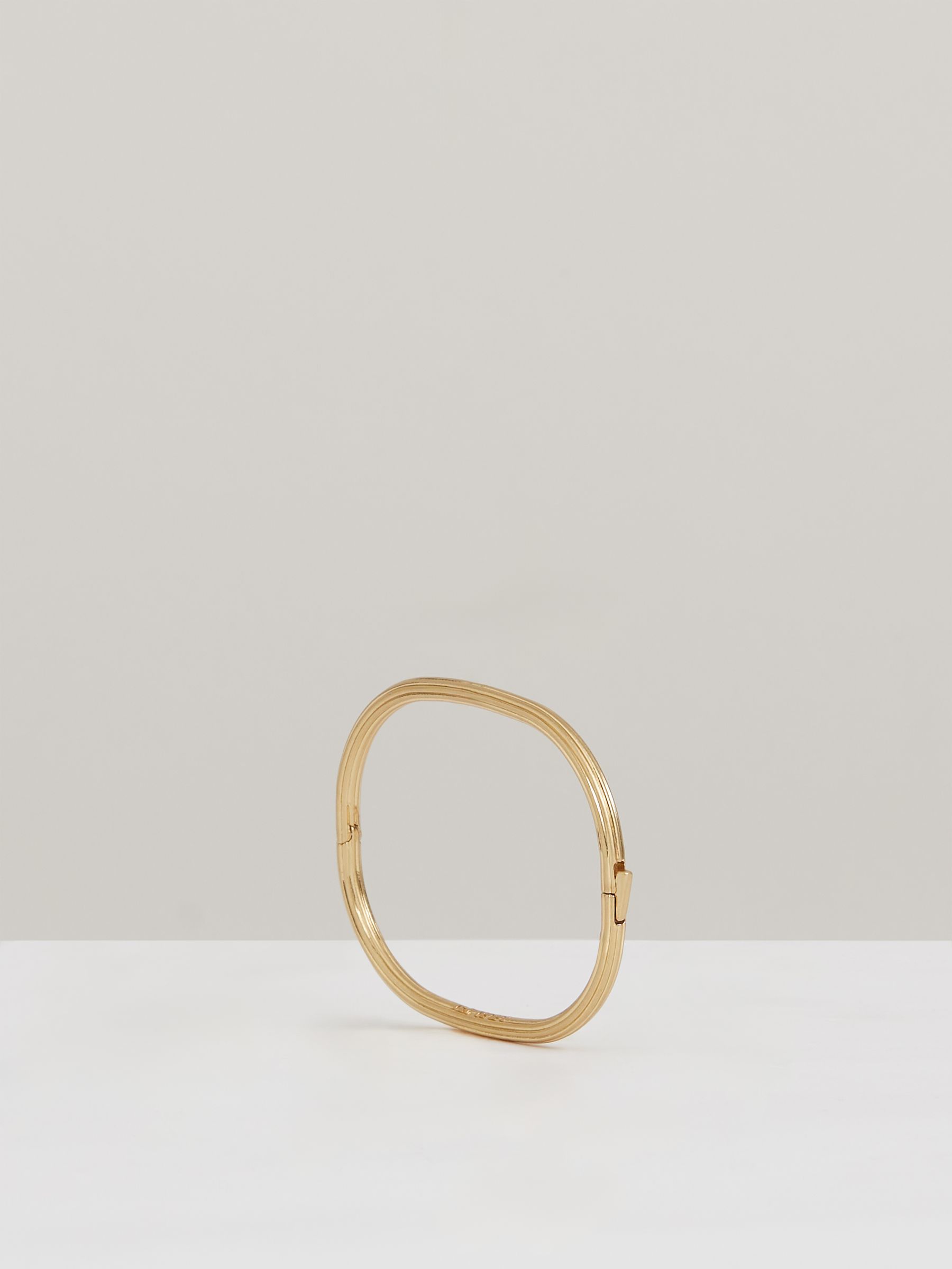 Contour Hinged Cuff in Gold Tone