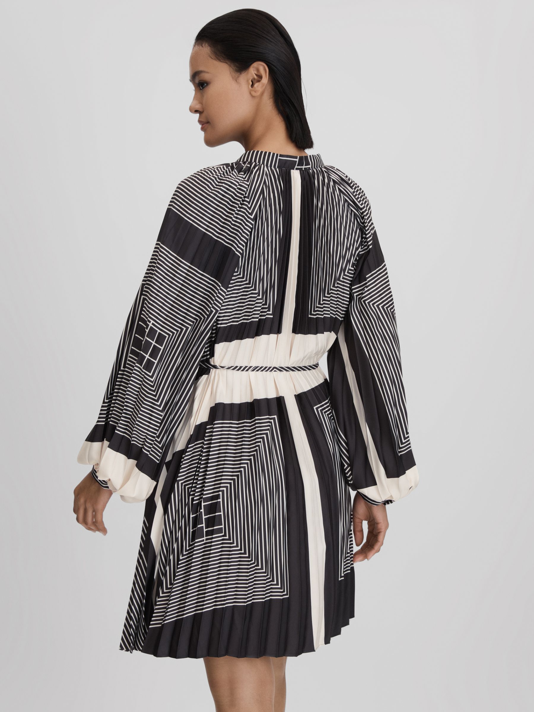 Printed Pleated Mini Dress in Black/White