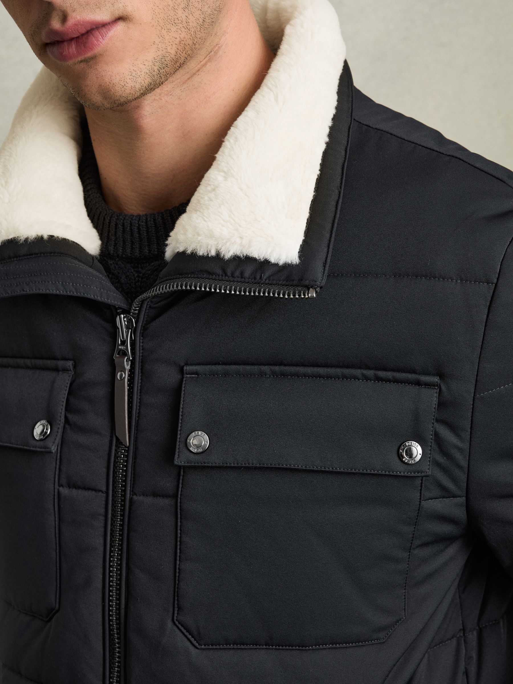 Faux-Fur Collar Puffer Jacket in Navy/ White Borg