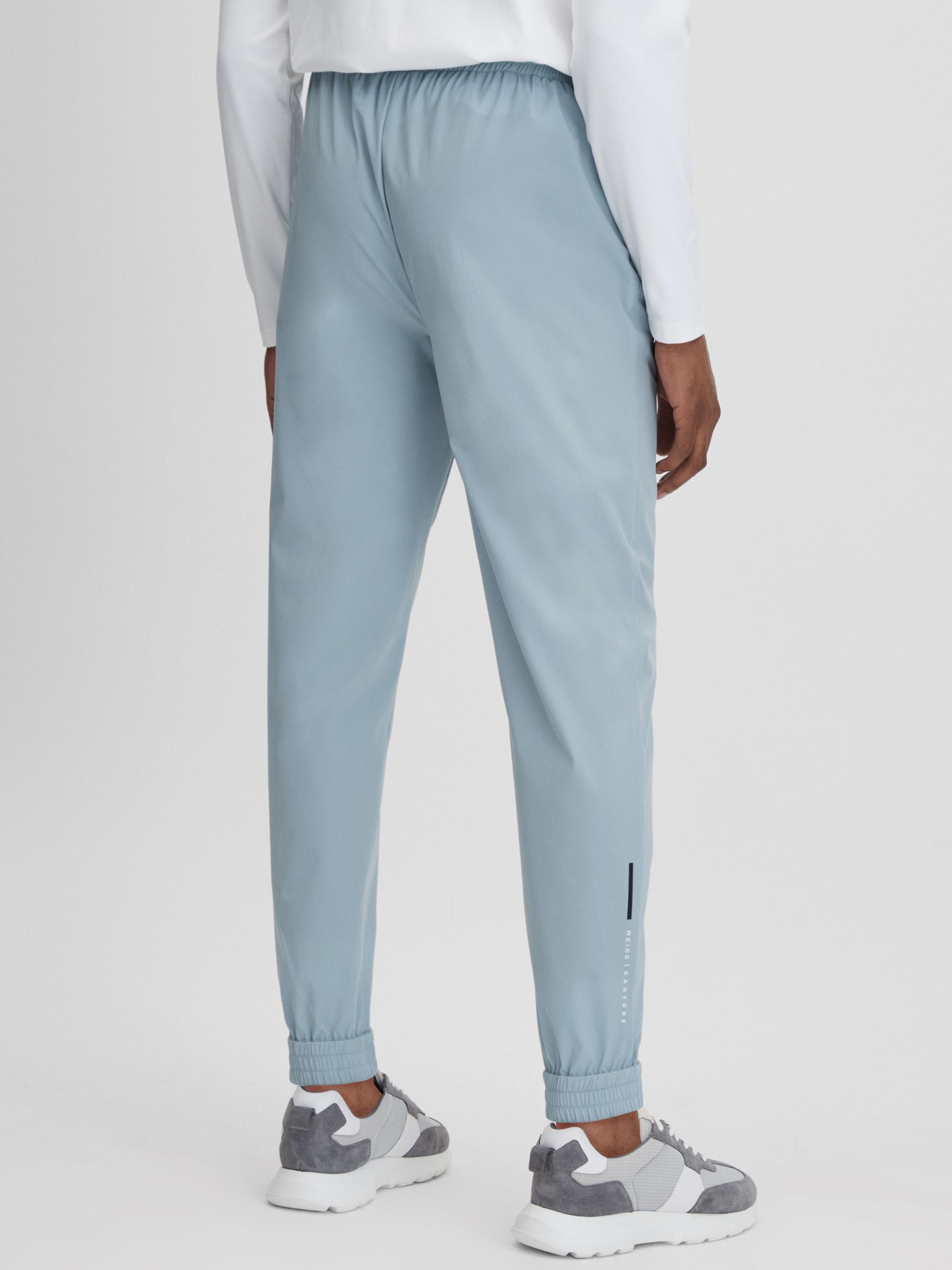 Castore Water Repellent Track Joggers in Blue Silver