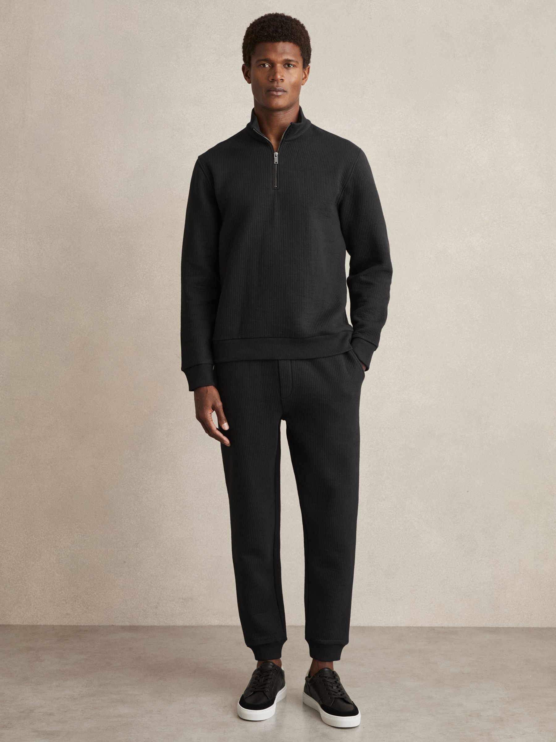 Cotton-Blend Ribbed Drawstring Joggers in Washed Black