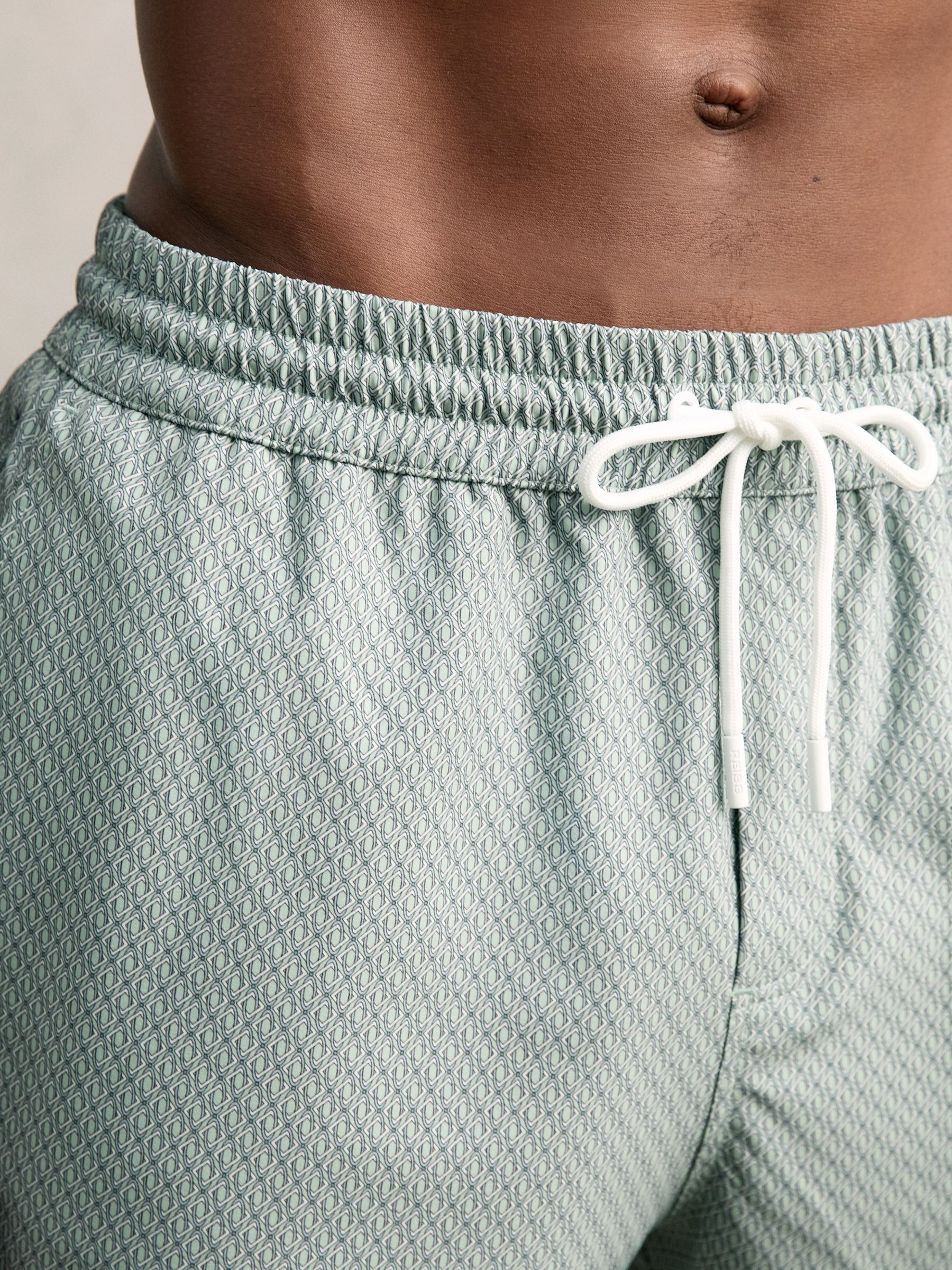 Drawstring Geometric Print Swim Shorts in Pistachio Green