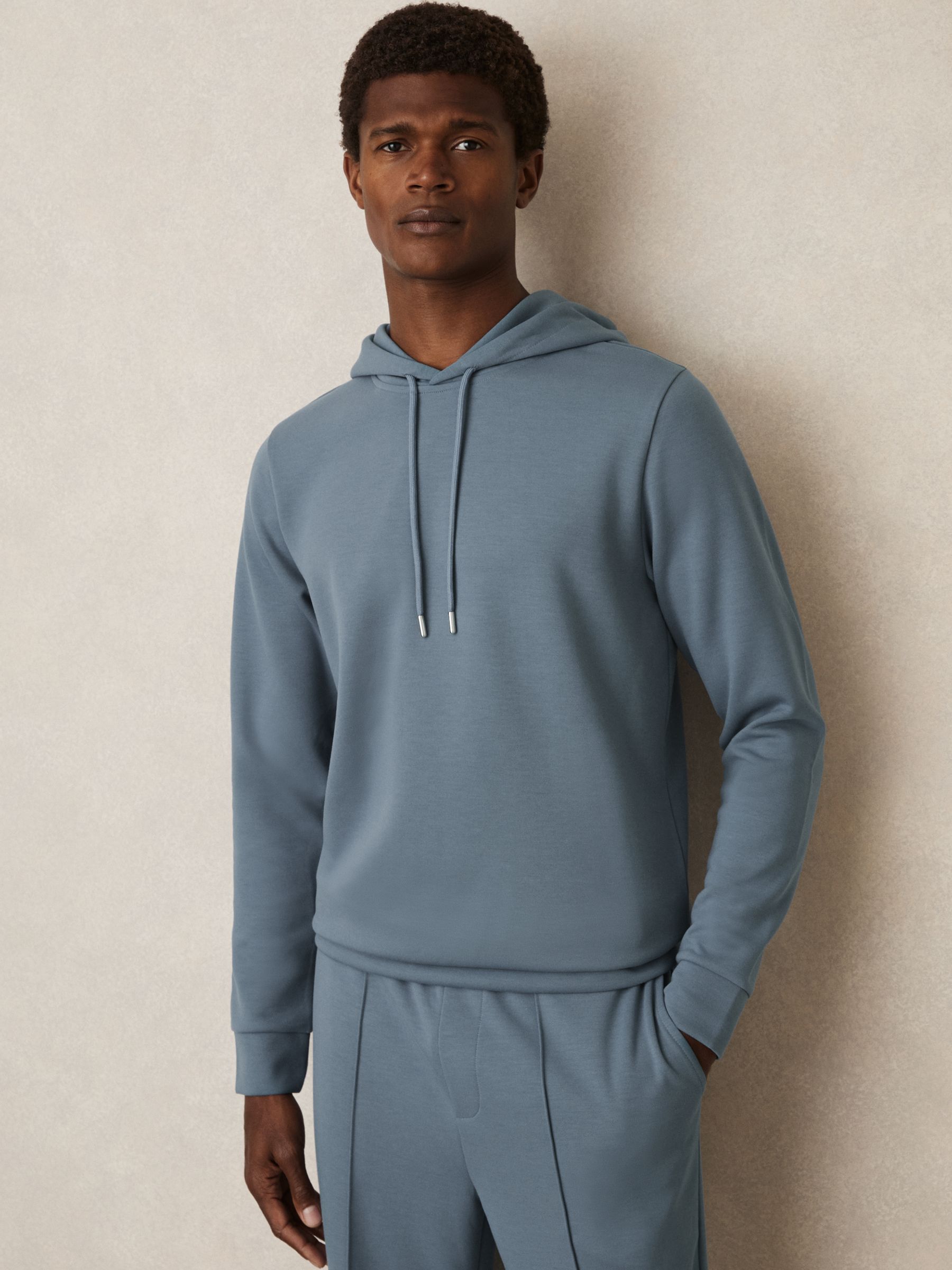 Interlock Jersey Drawstring Hoodie in Airforce Blue