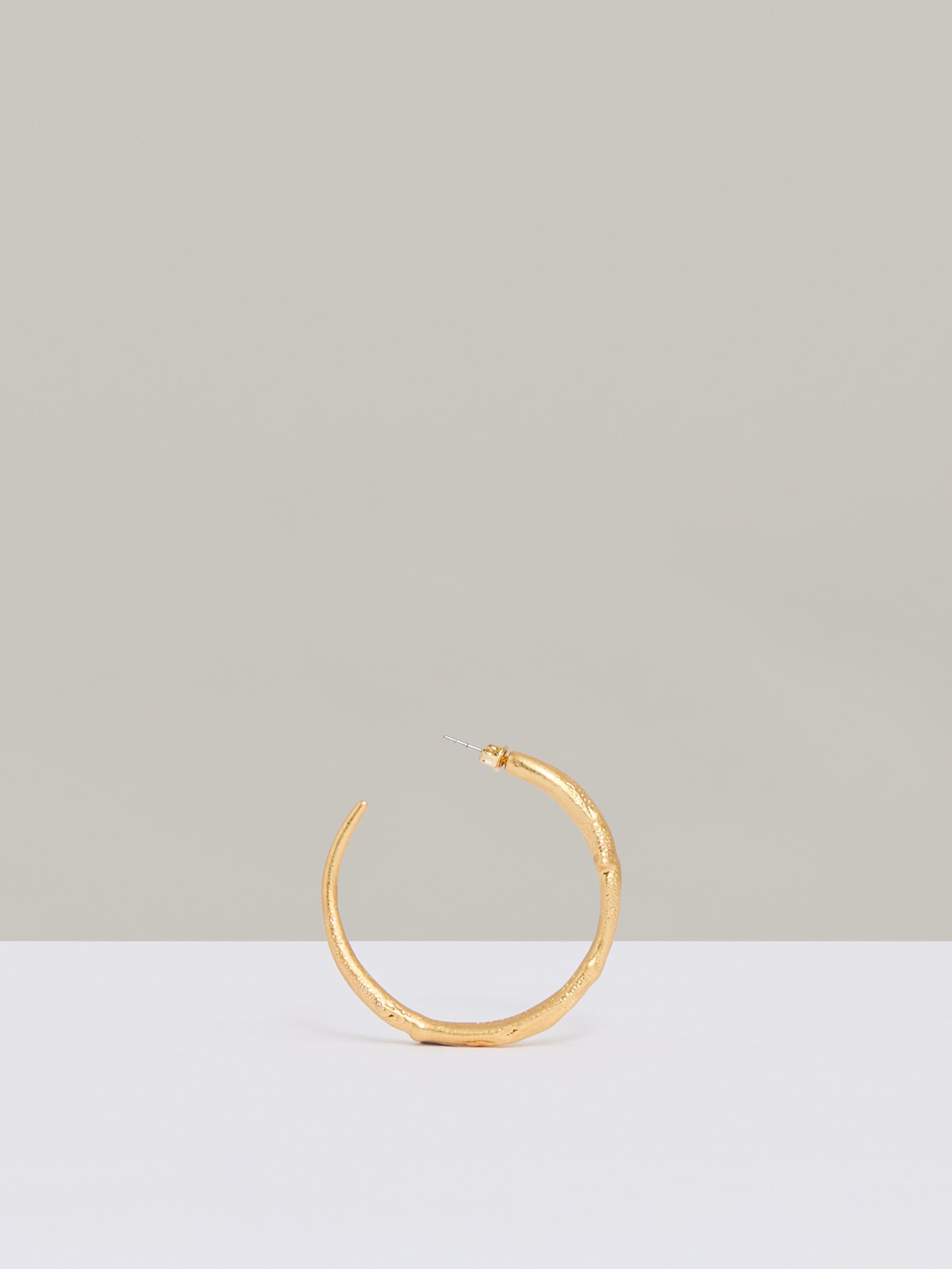 Molten Hoop Earrings in Gold Tone