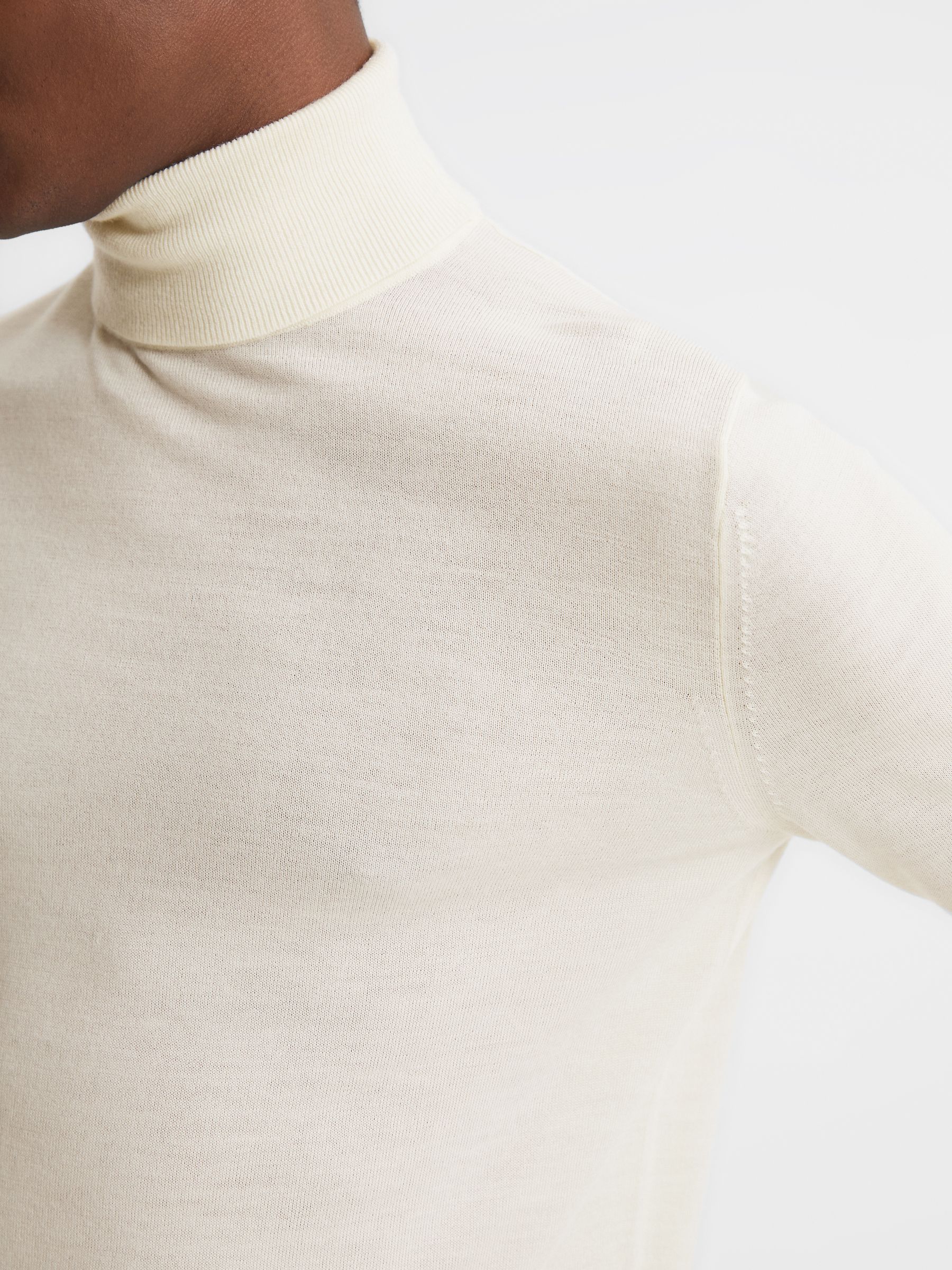 Slim Fit Merino Wool Roll Neck Jumper in Bianco