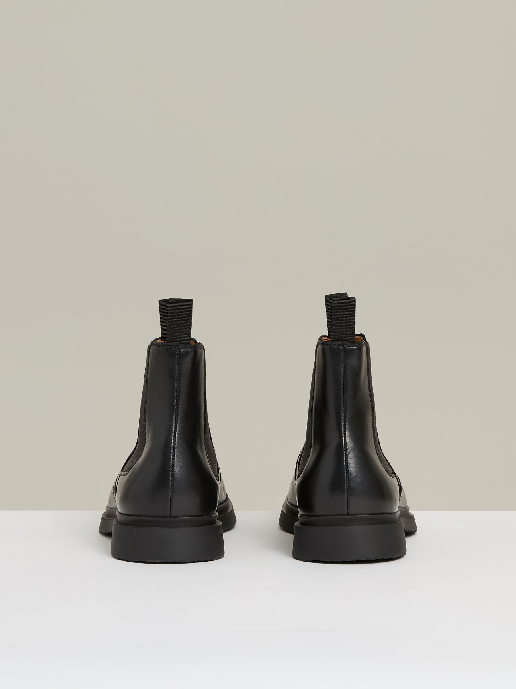 Leather Rubber Sole Chelsea Boots in Black