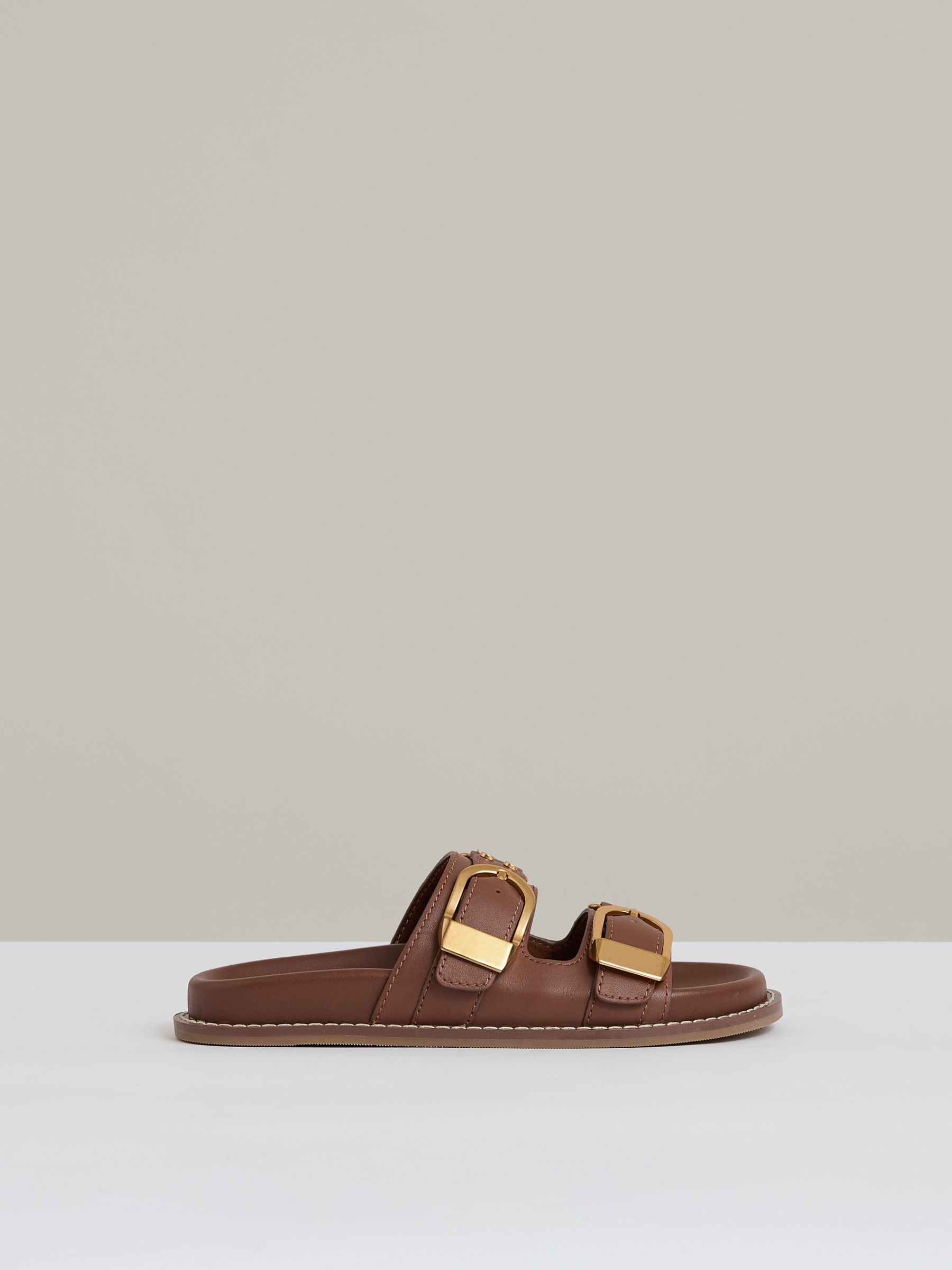 Leather Buckled Slip-On Sandals in Tan