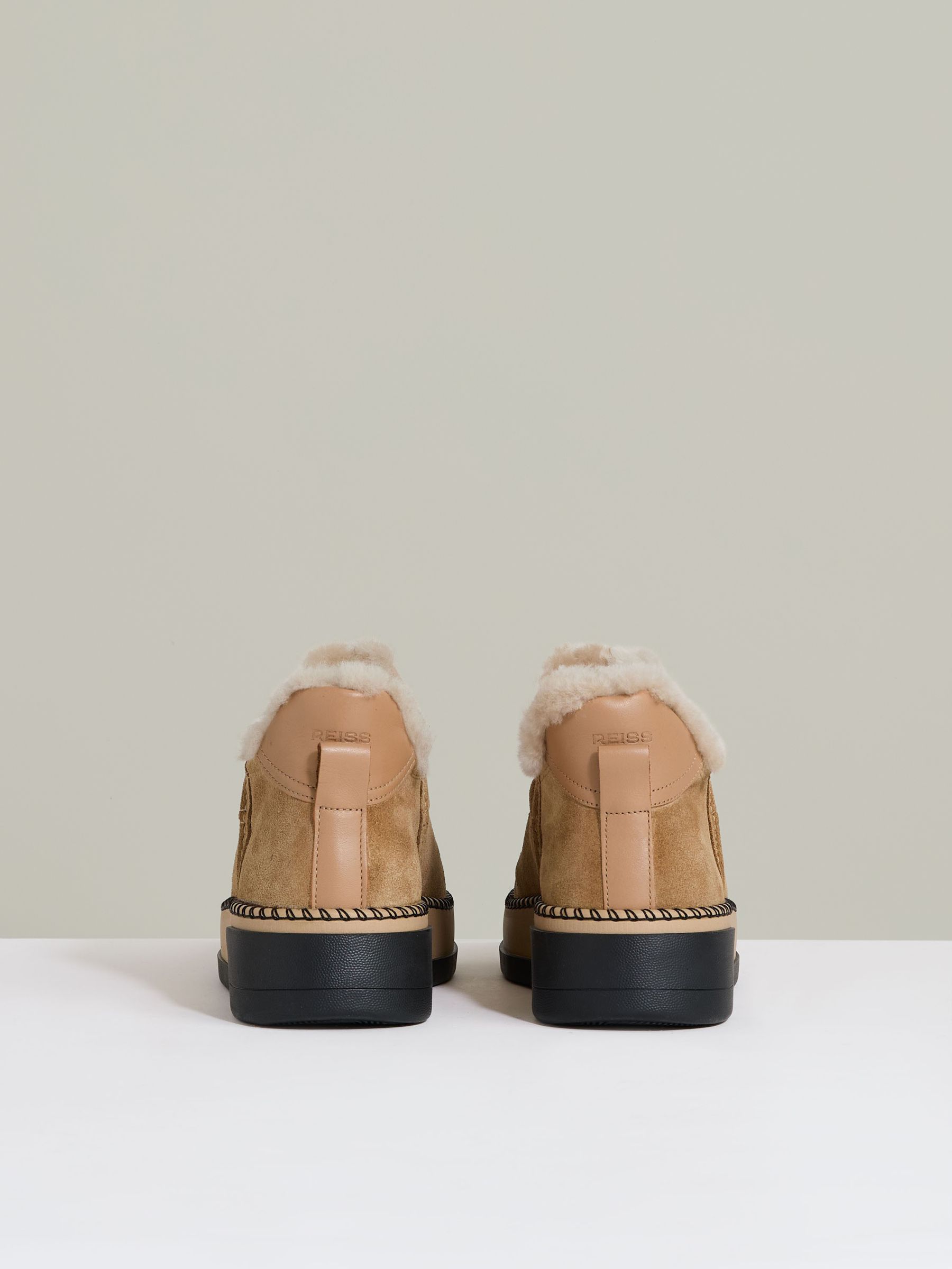 Shearling-Lined Suede Ankle Boots in Tan
