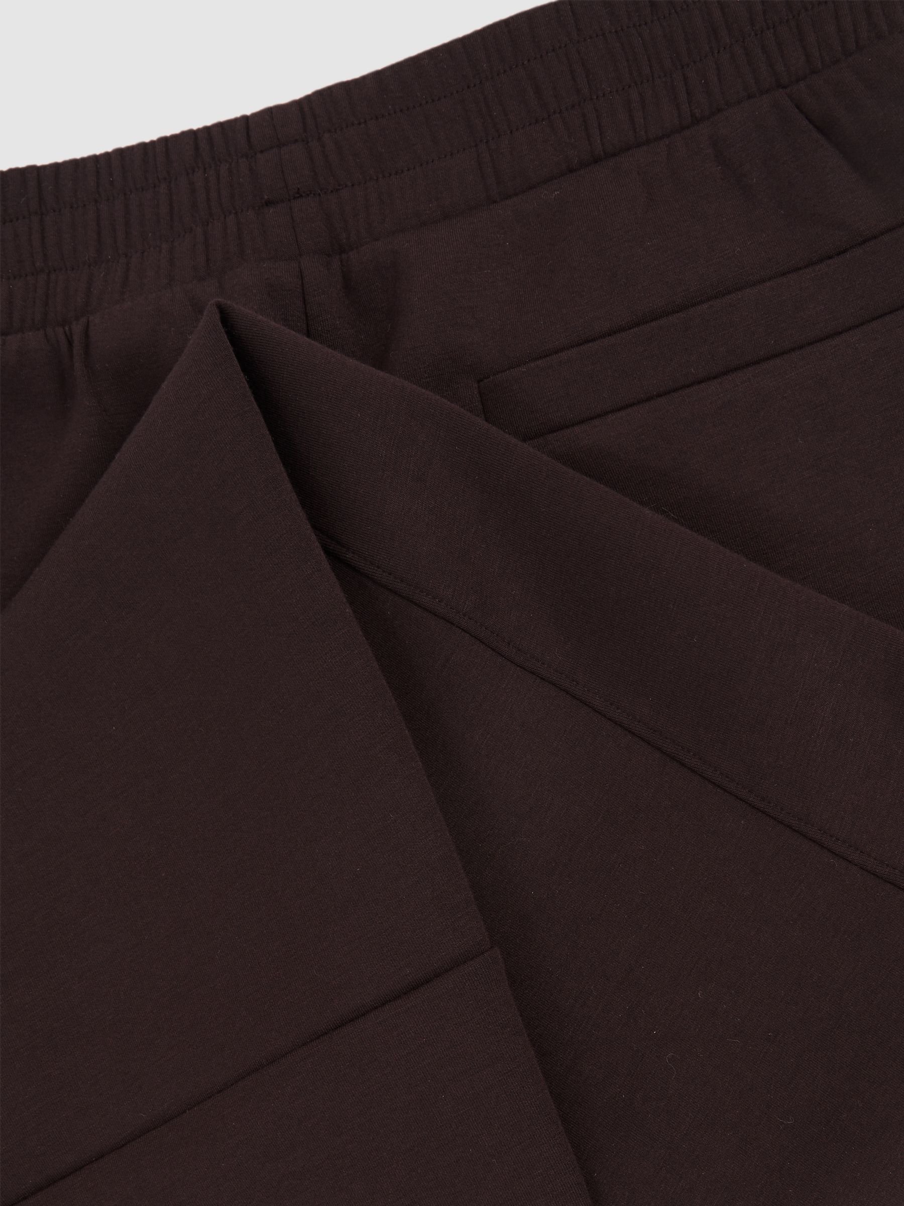 Interlock Tapered Joggers in Plum