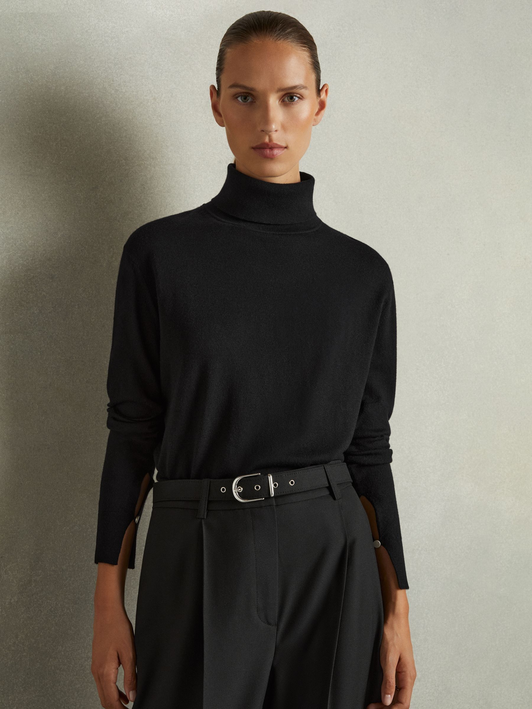 Merino Wool Roll Neck Jumper in Black