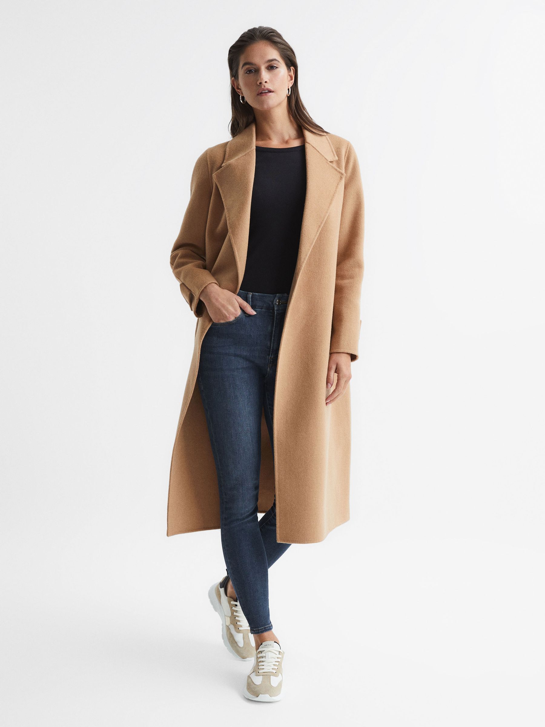 Good American Released Hem Skinny Jeans in Dark Blue