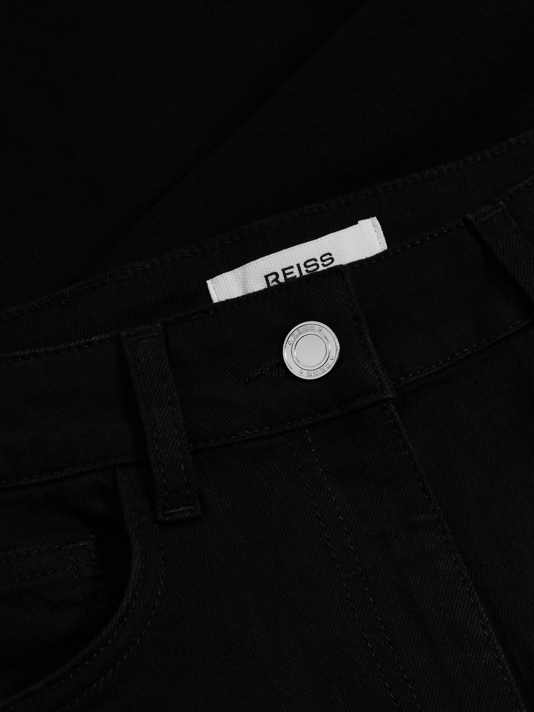 Mid-Rise Flared Jeans in Black