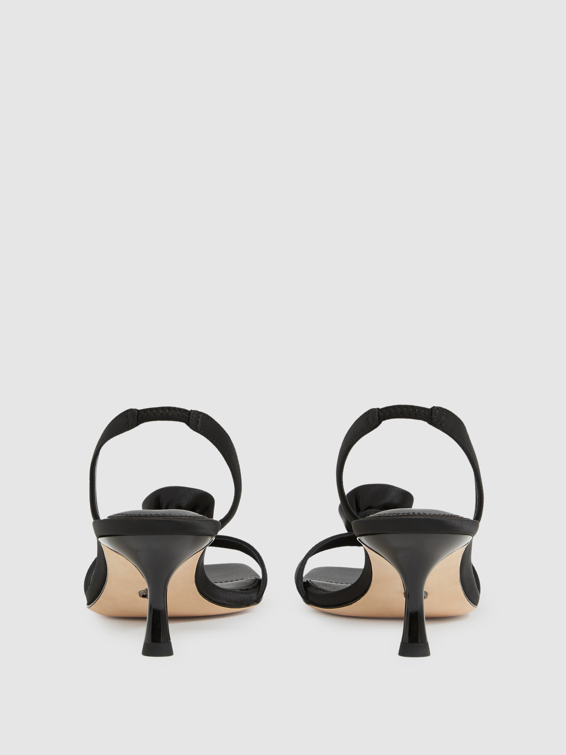 Paige Satin Rosette Sandals in Black