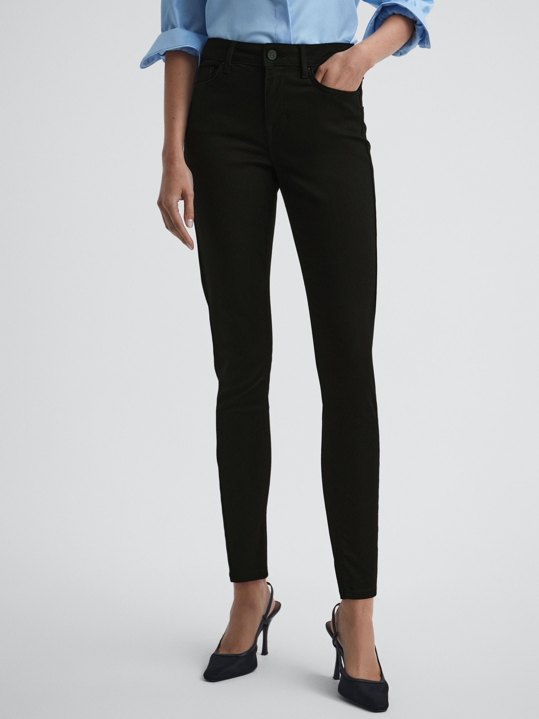 Mid Rise Skinny Jeans in Black