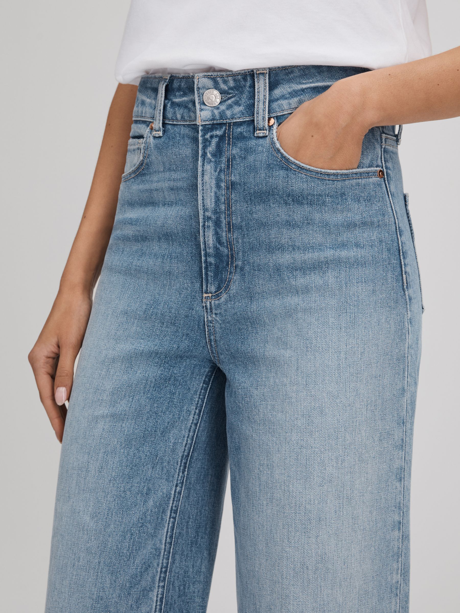 Paige Wide Leg Distressed Jeans in Magnifique Blue