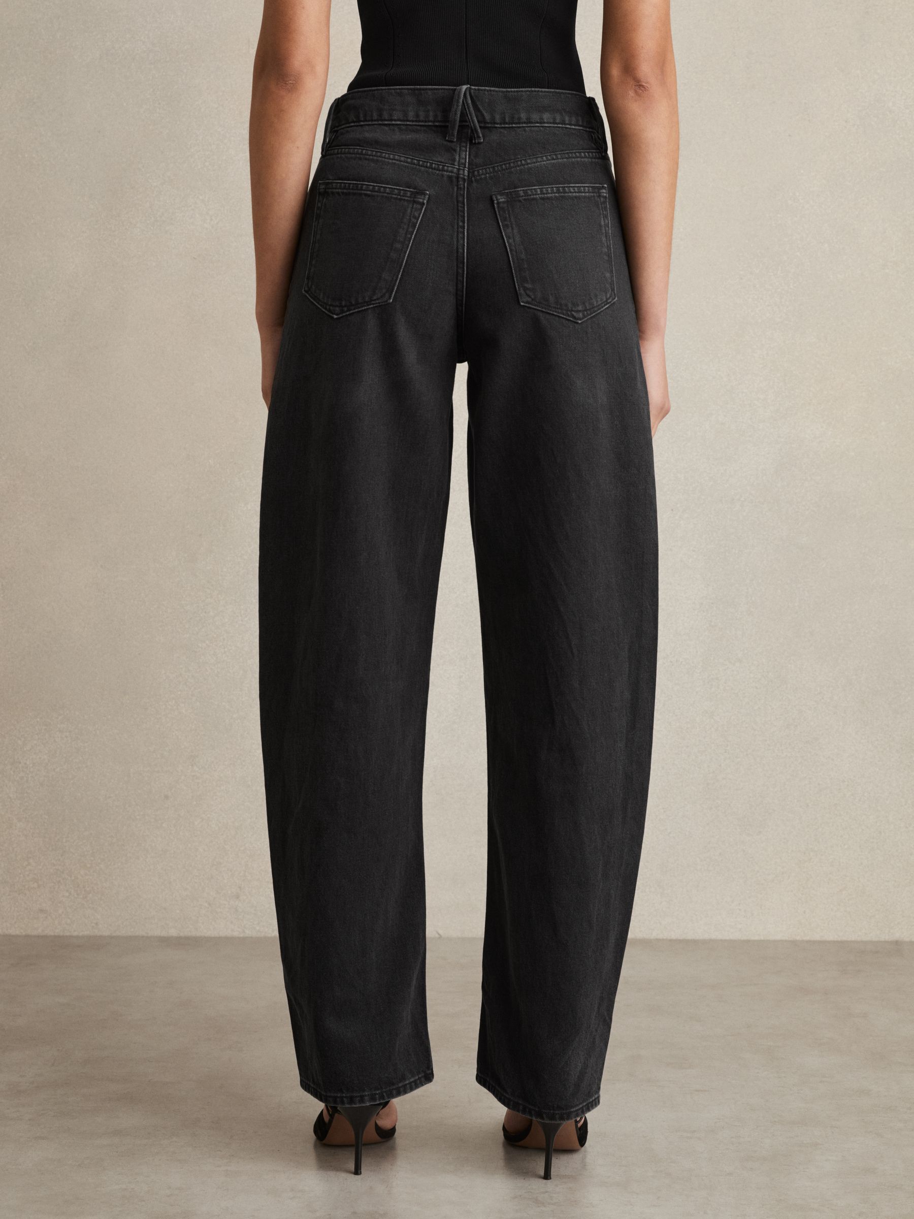 Good American Relaxed Barrel Jeans in Black
