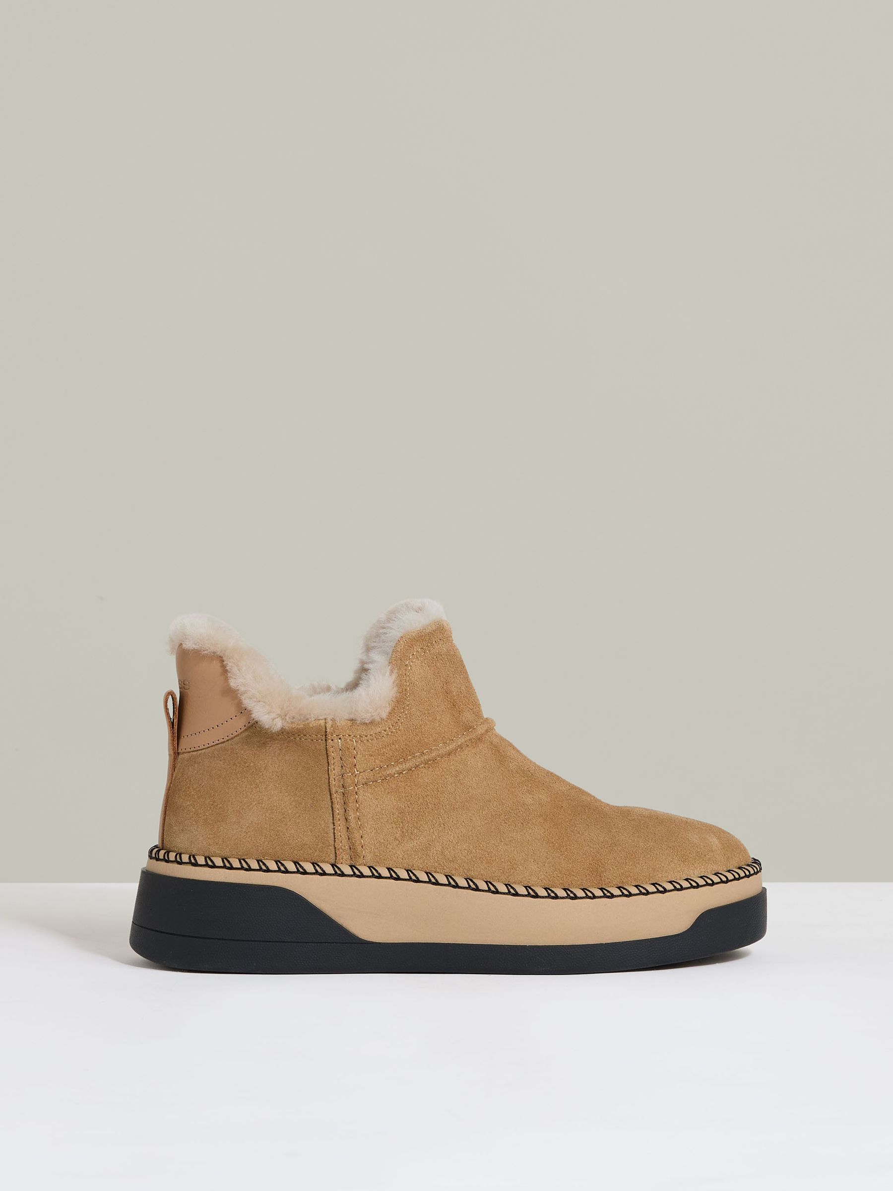 Shearling-Lined Suede Ankle Boots in Tan