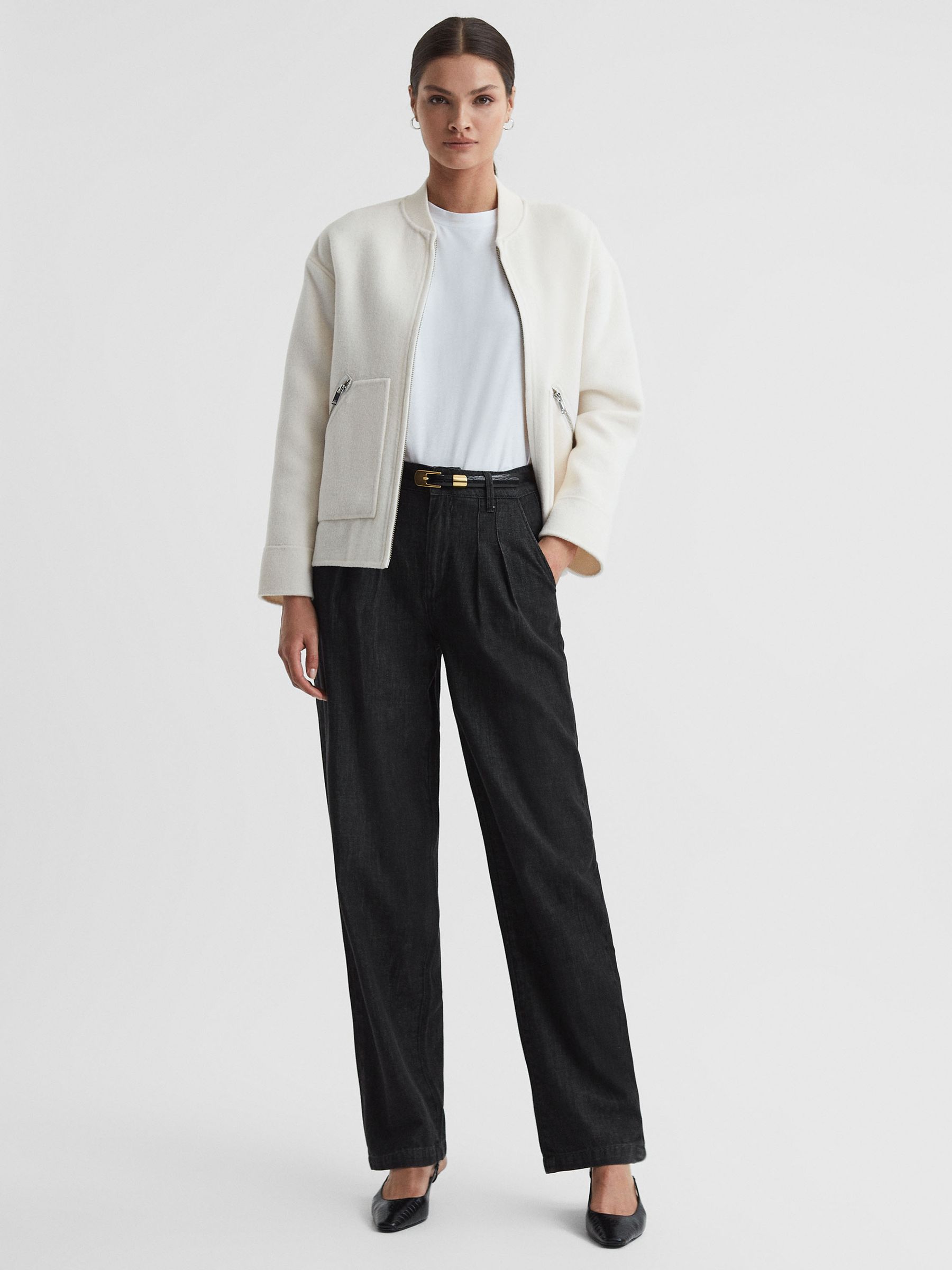 Paige High Rise Tapered Jeans in Washed Black