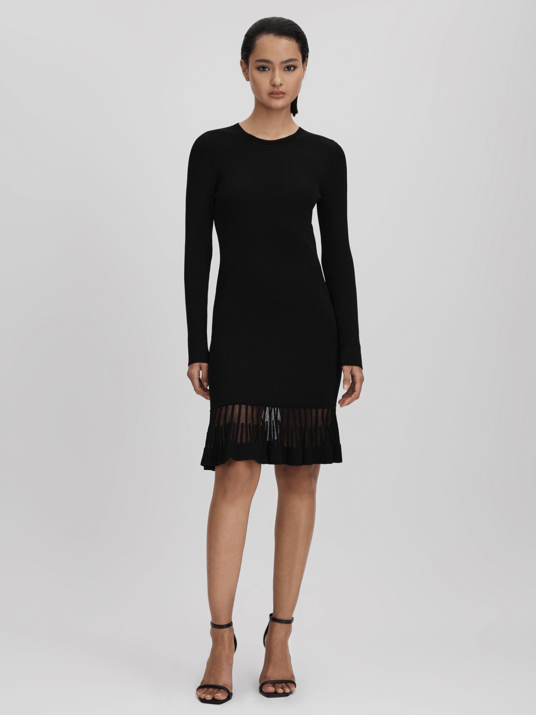 Knitted Sheer Flared Mini Dress in Black
