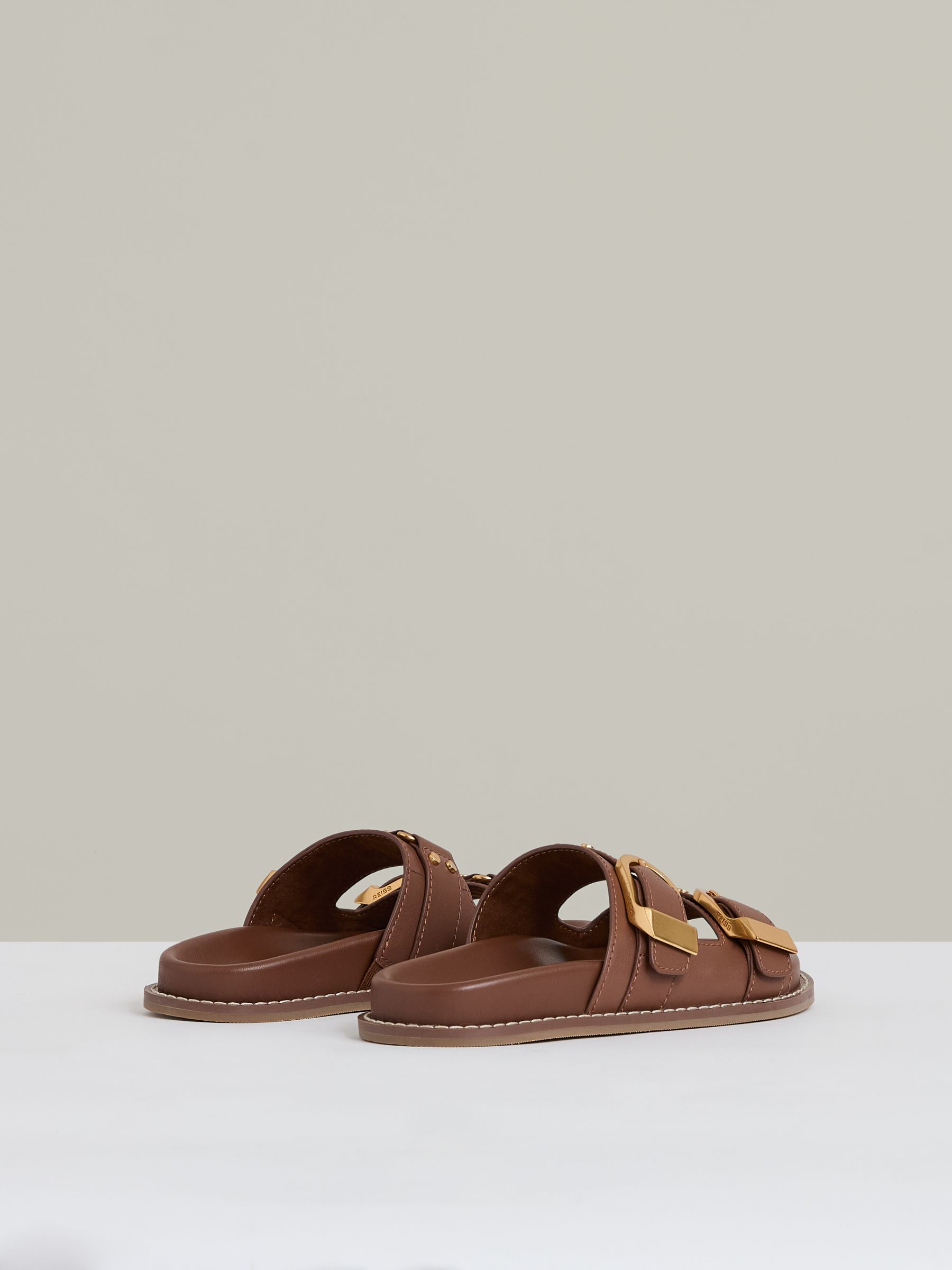 Leather Buckled Slip-On Sandals in Tan