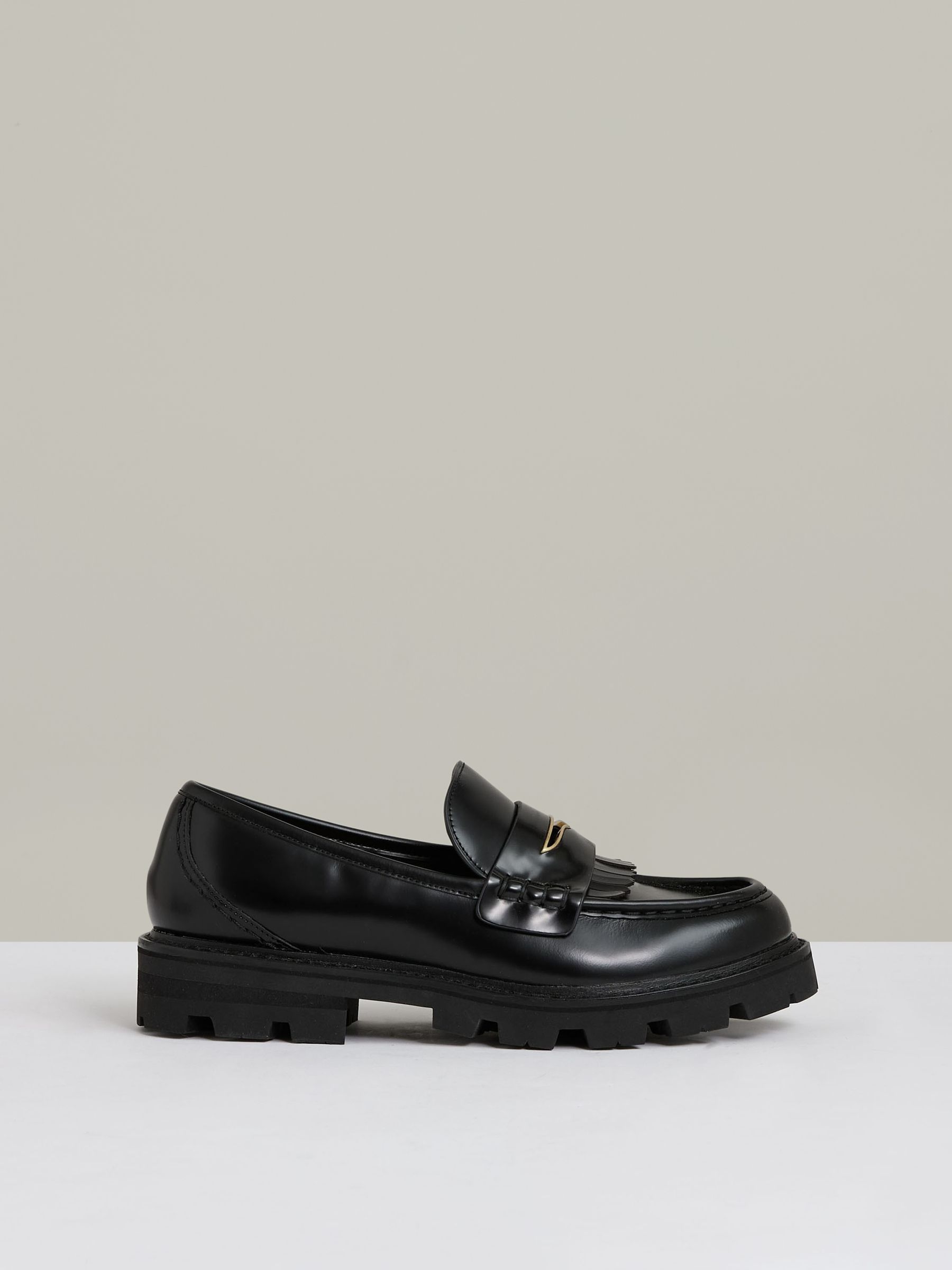 Leather Fringed Chunky Penny Loafers in Black