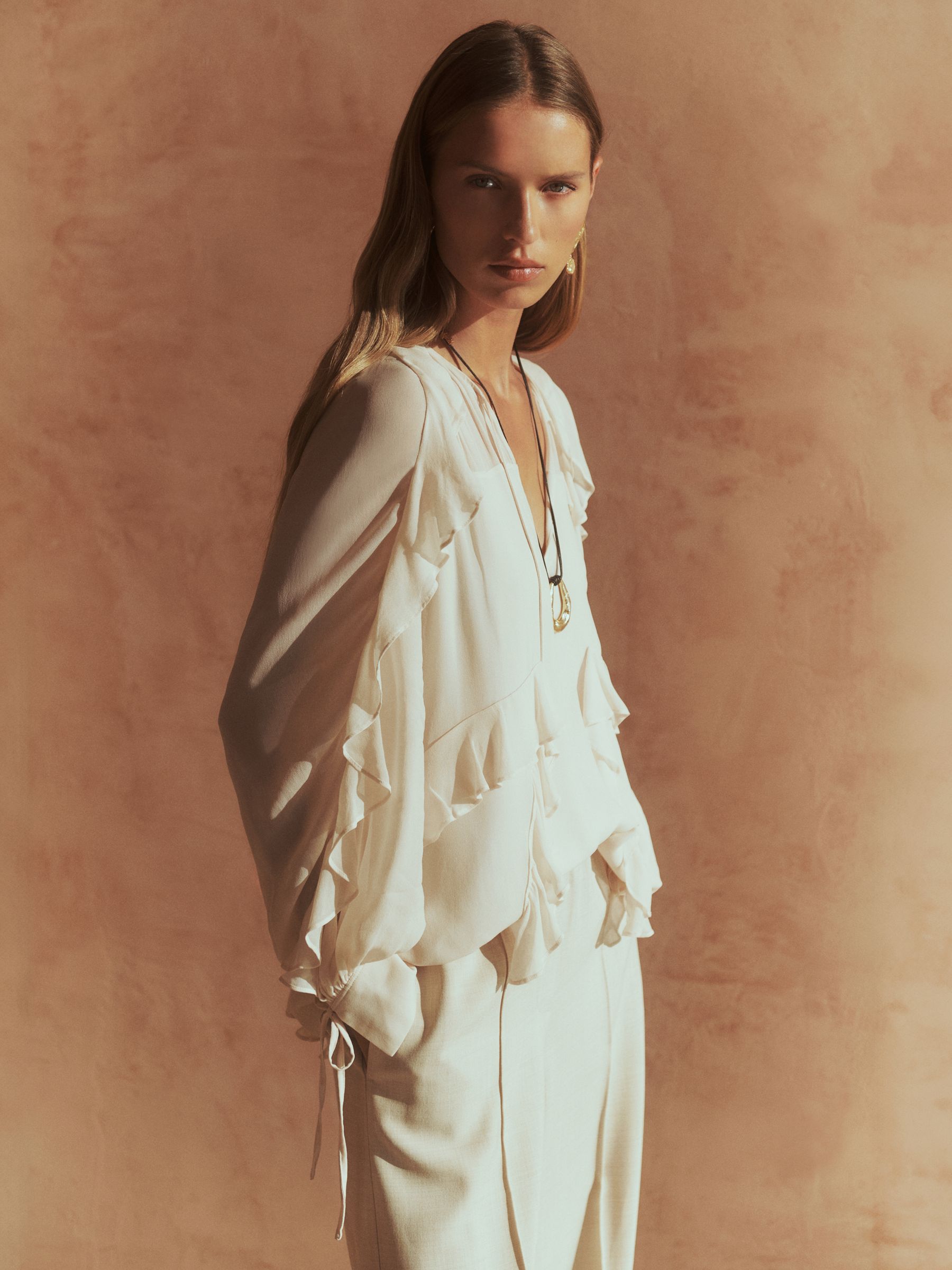 Ruffle Trim Tie Neck Top in Pale Pink