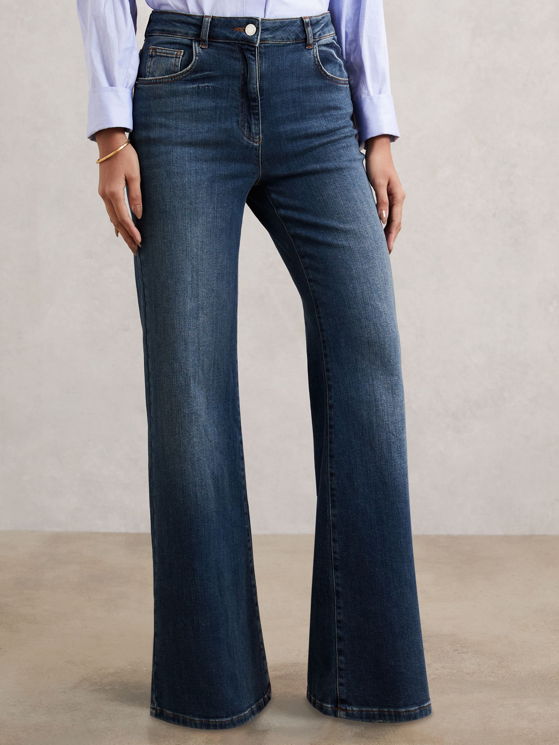 Petite Mid-Rise Flared Jeans in Mid Blue