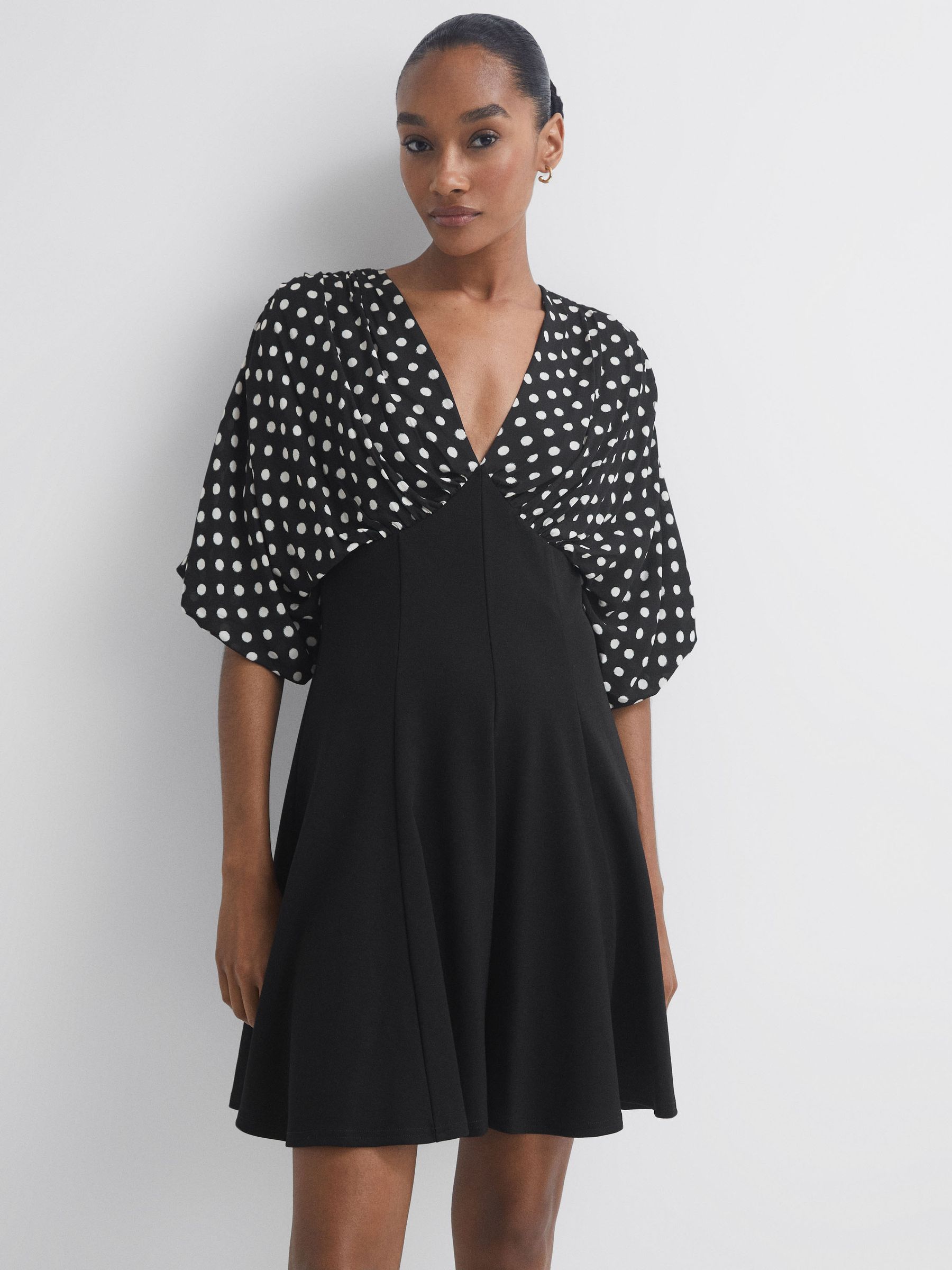 Florere Polka Dot Mini Skater Dress in Black