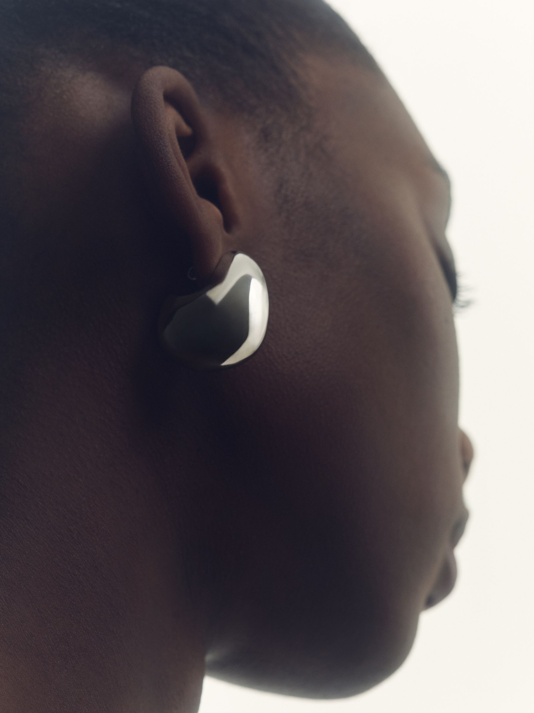 Curve Scoop Earrings in Silver Tone