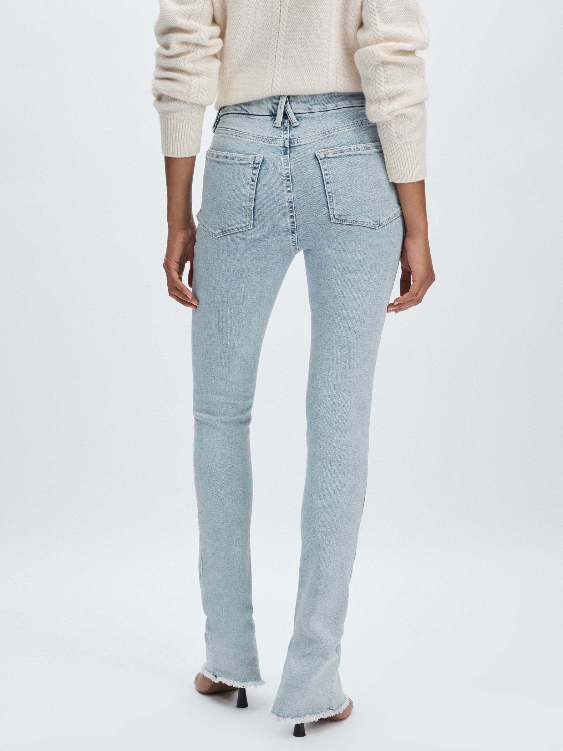Good American Split-Hem Skinny Jeans in Light Blue