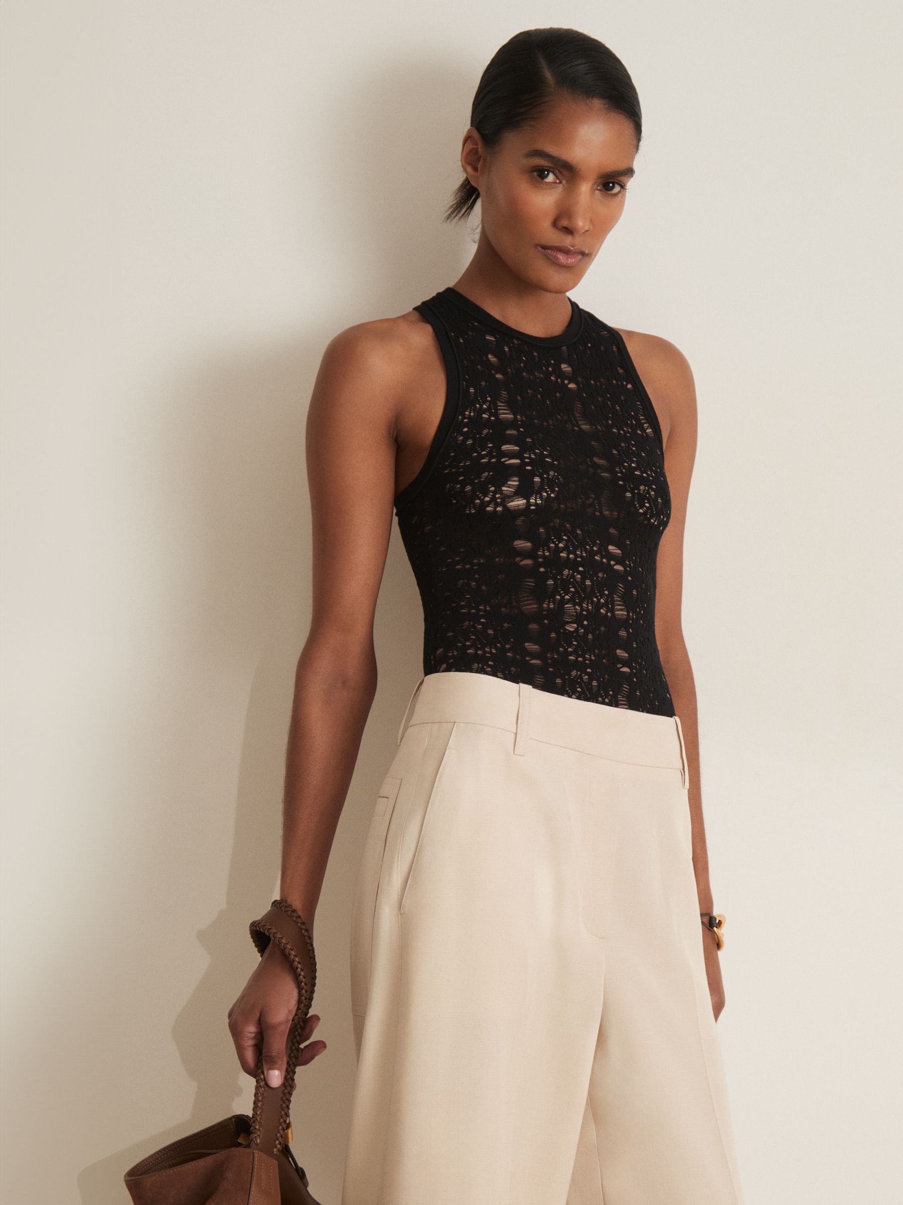 Atelier Lace-Knit High-Neck Bodysuit in Black