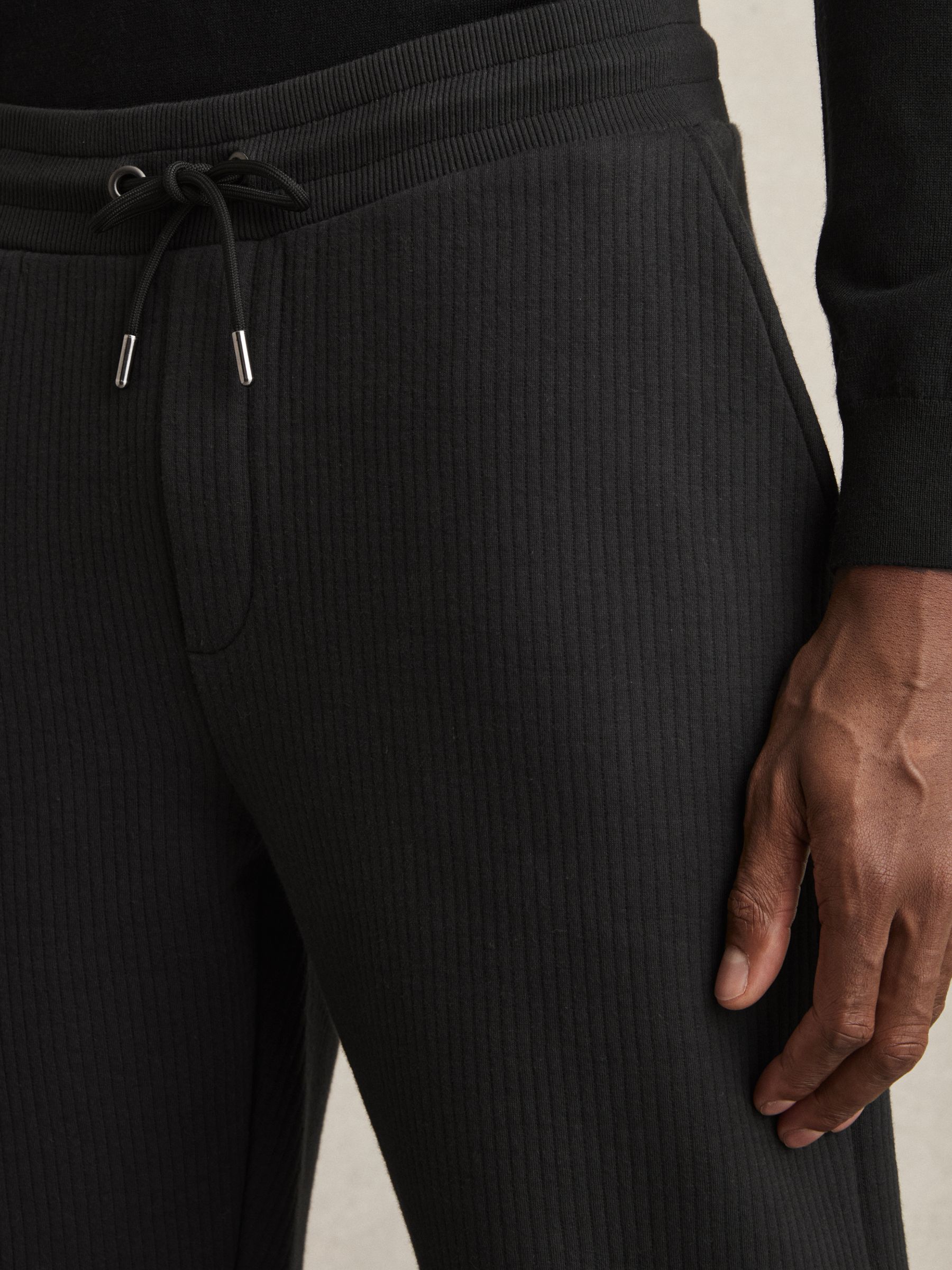 Cotton-Blend Ribbed Drawstring Joggers in Washed Black