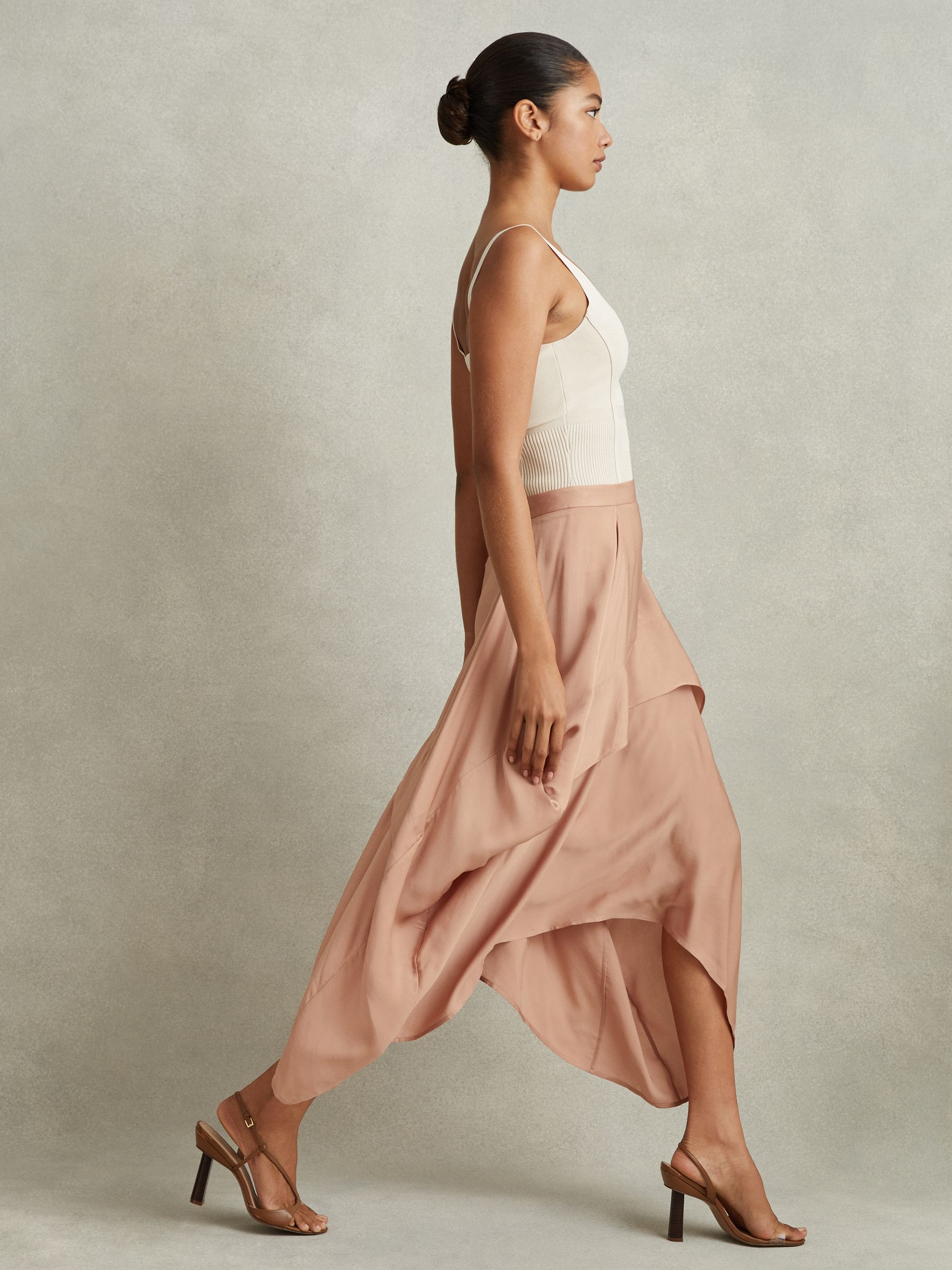 Side Pleat Asymmetric Midi Skirt in Nude