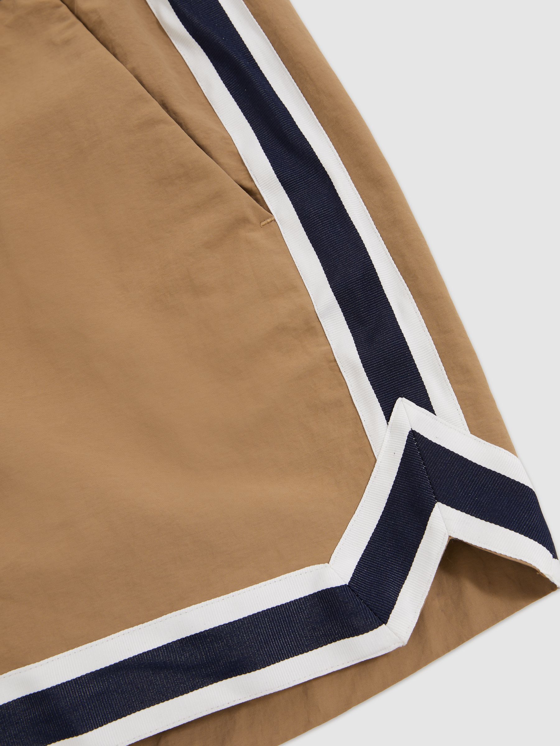 Reiss | Ché Stripe-Trim Swim Shorts in Camel