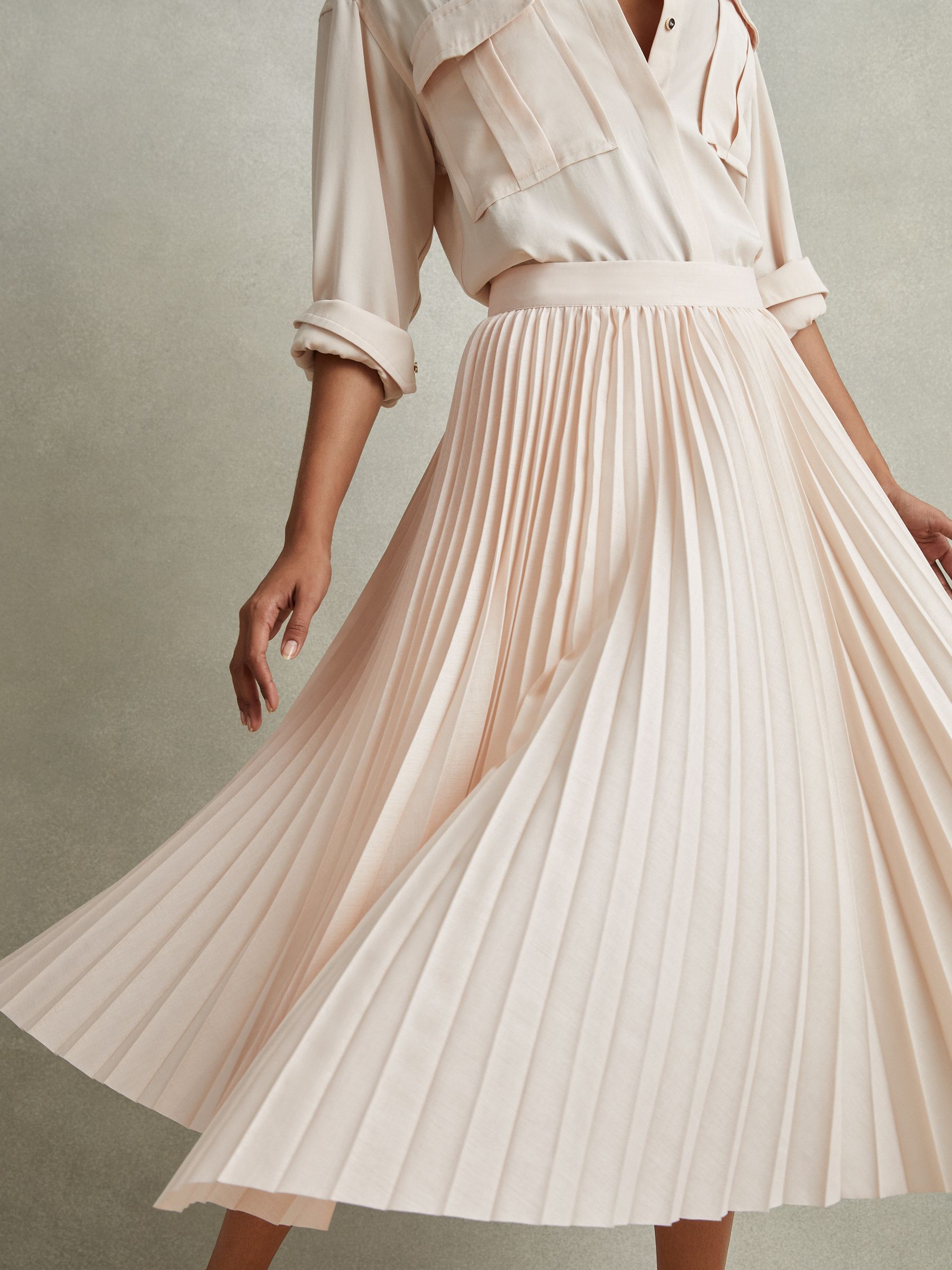 Pleated Asymmetric Midi Skirt in Blush