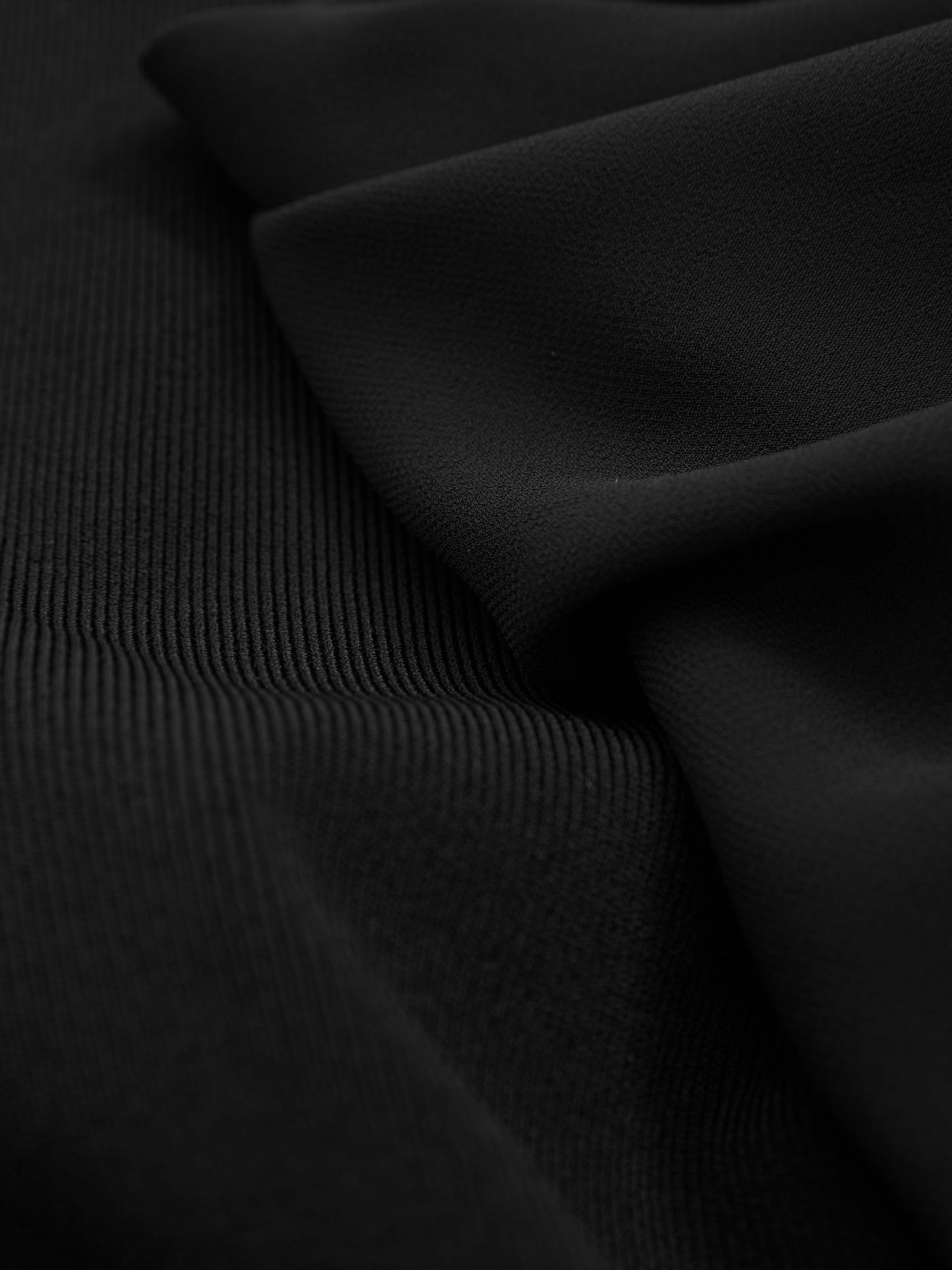 Florere Hybrid Knit Sheer Sleeve Black Top in Black