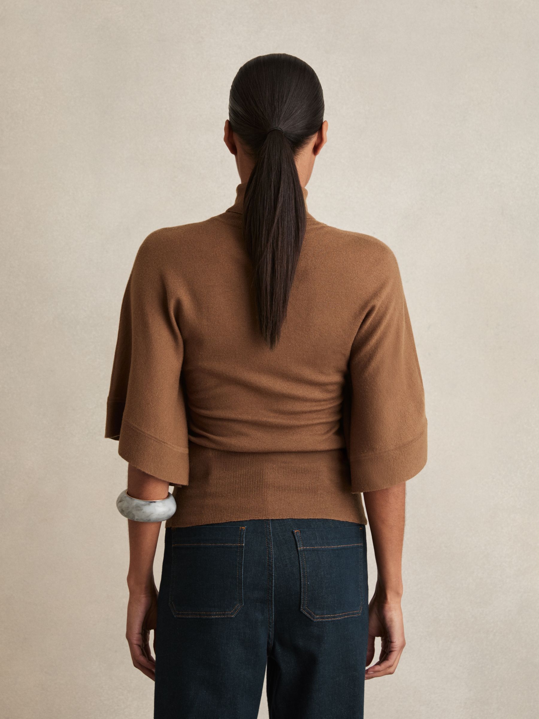 Merino Wool Batwing Roll-Neck Jumper in Tan