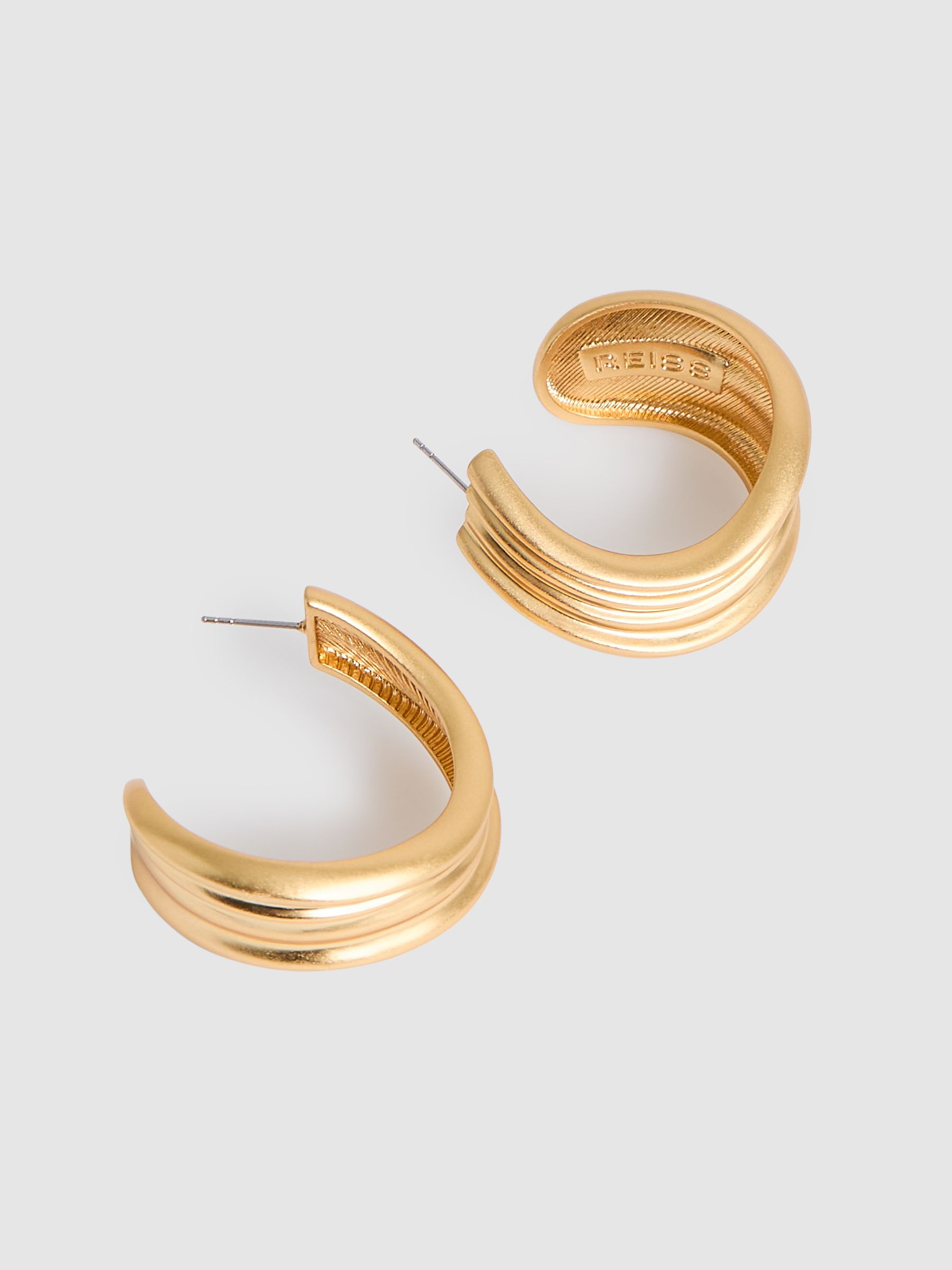 Fluid Hoop Earrings in Gold Tone