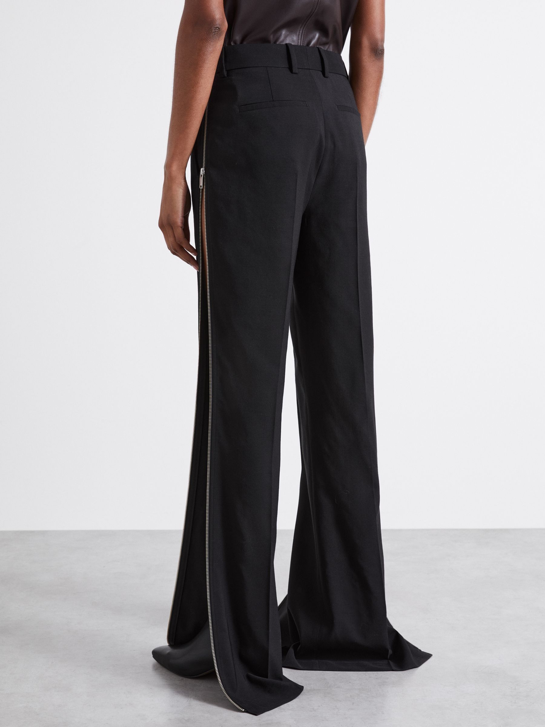 Atelier Virgin-Wool Zipped-Outseam Trousers in Black