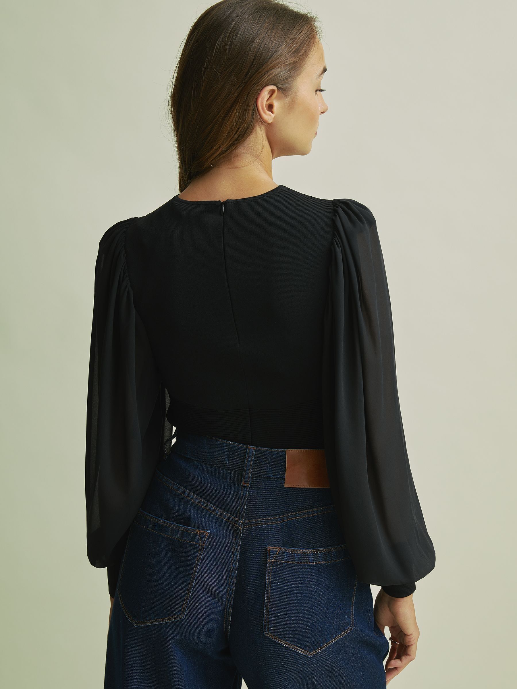 Florere Hybrid Knit Sheer Sleeve Black Top in Black