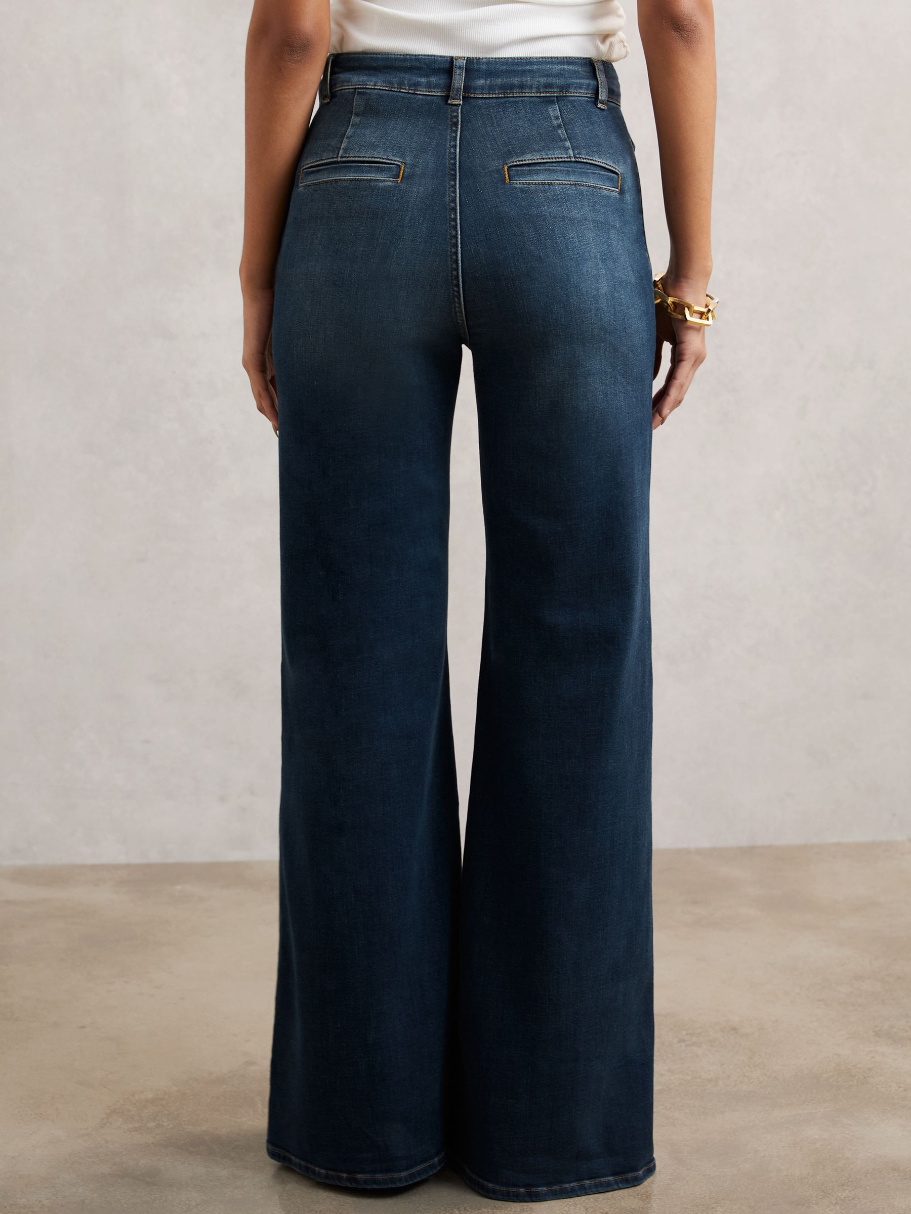 Button-Pocket Flared Jeans in Mid Blue