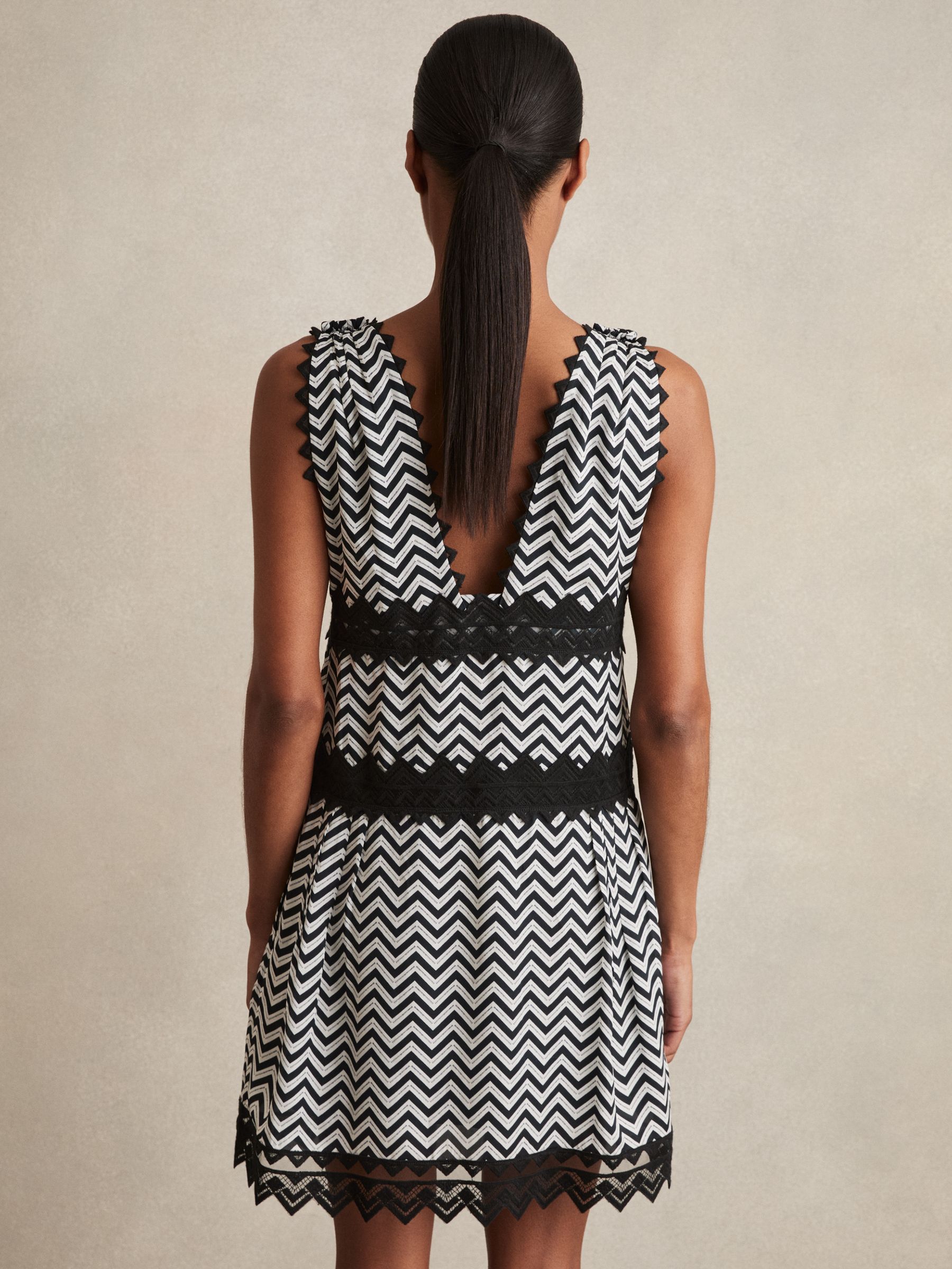 Zig-Zag Print Lace-Trim Mini Dress in Navy