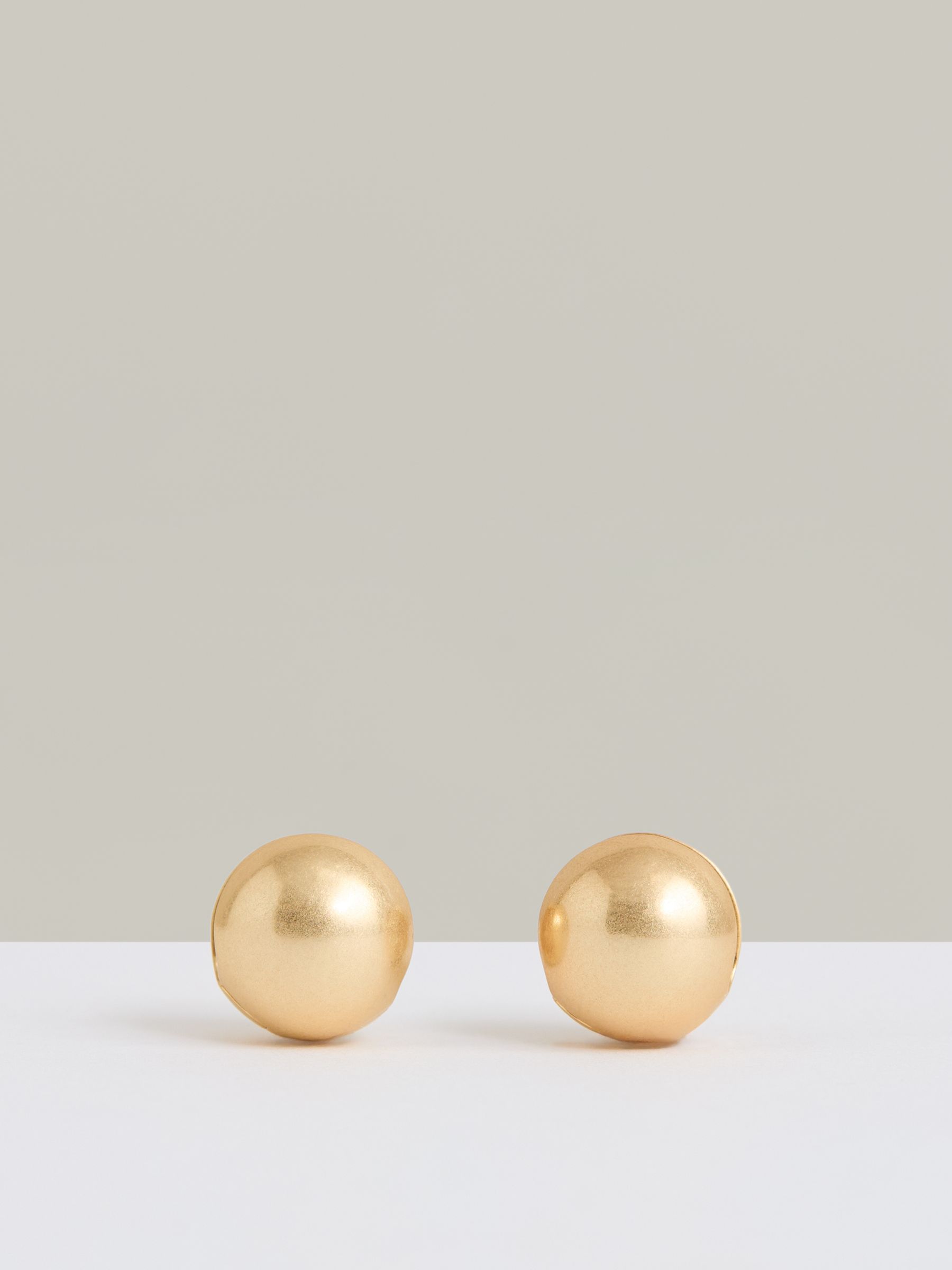Polished Ball Huggie Earrings in Gold
