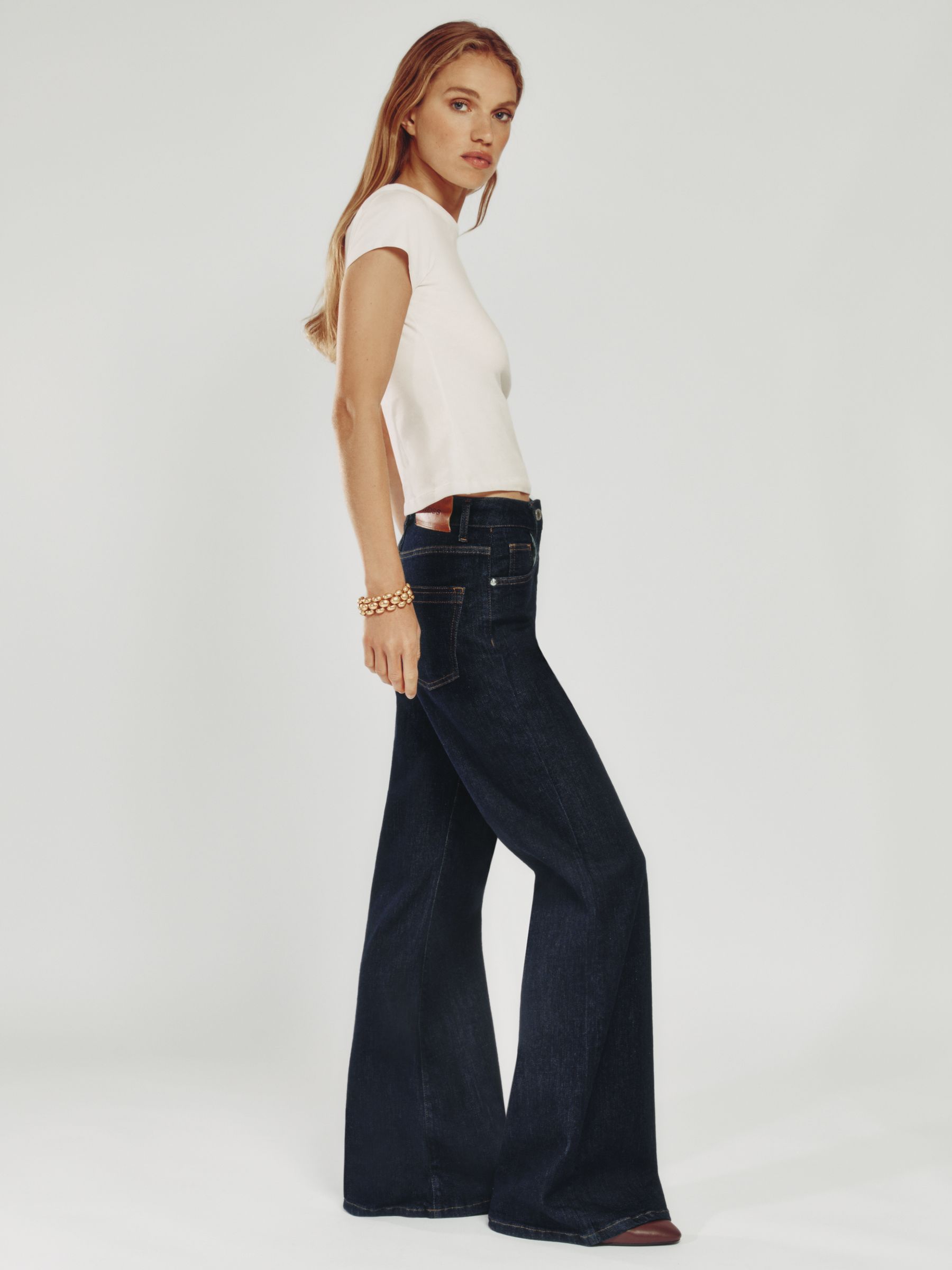 Petite Mid-Rise Flared Jeans in Dark Blue